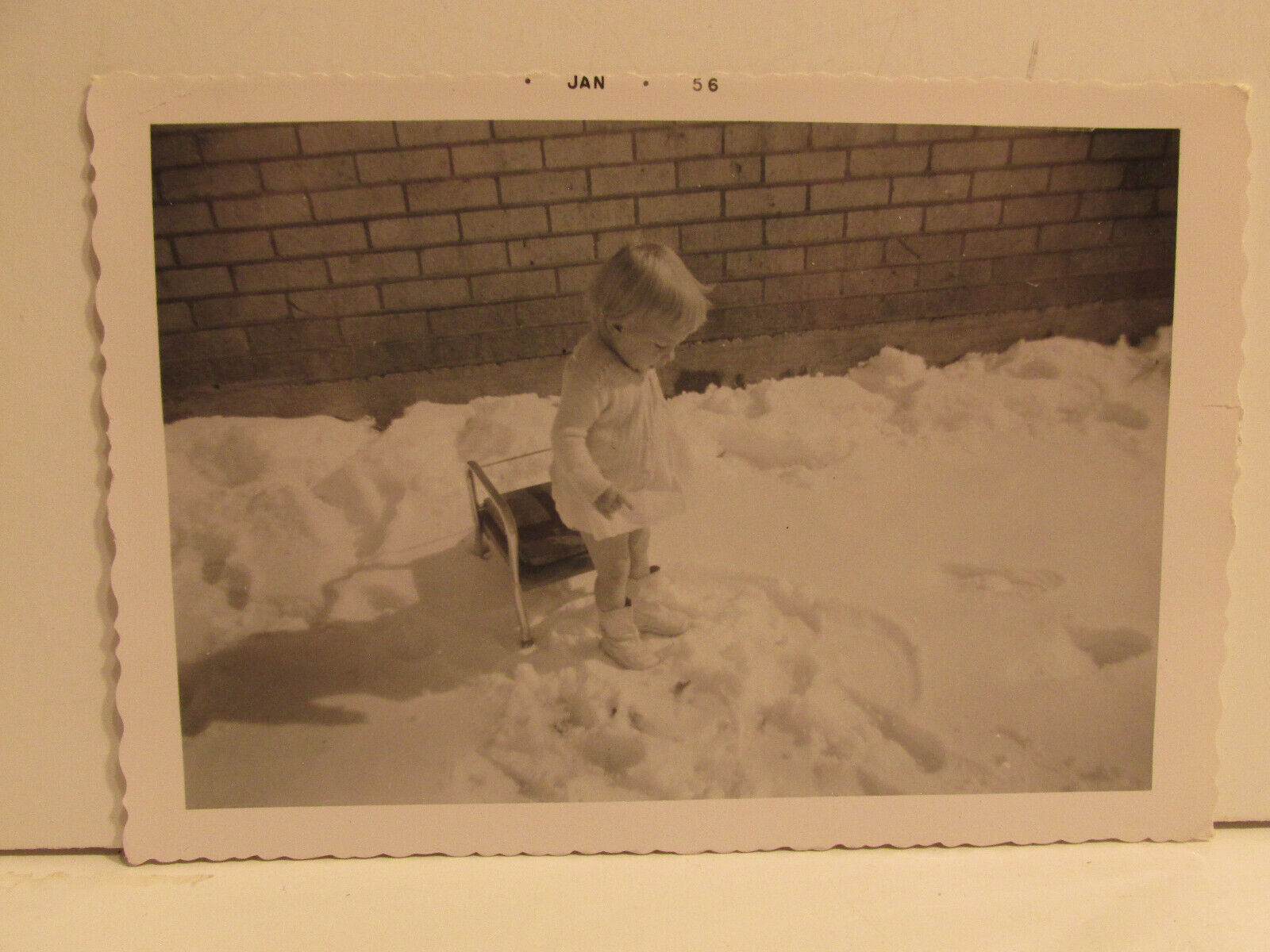 VINTAGE FOUND PHOTOGRAPH B&W ART OLD PHOTO 1950S BLONDE TODDLER GIRL IN SNOW PIC