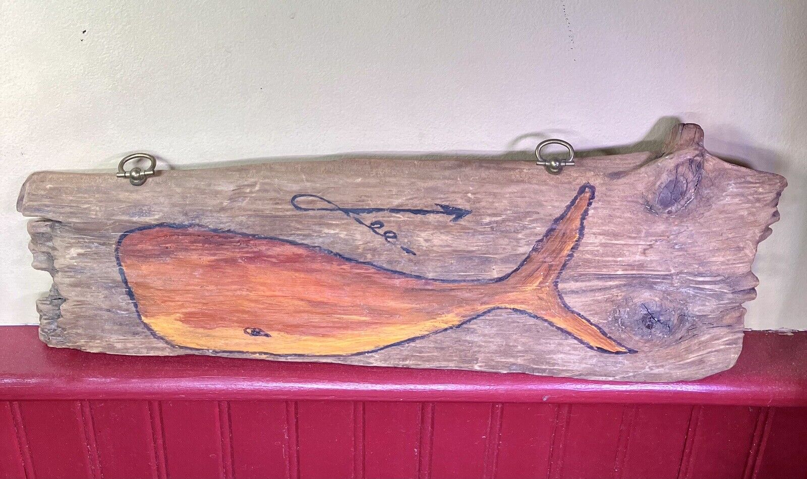 Driftwood with Orange Painted Whale Signed by Lee bought on CapeCod Wonderful