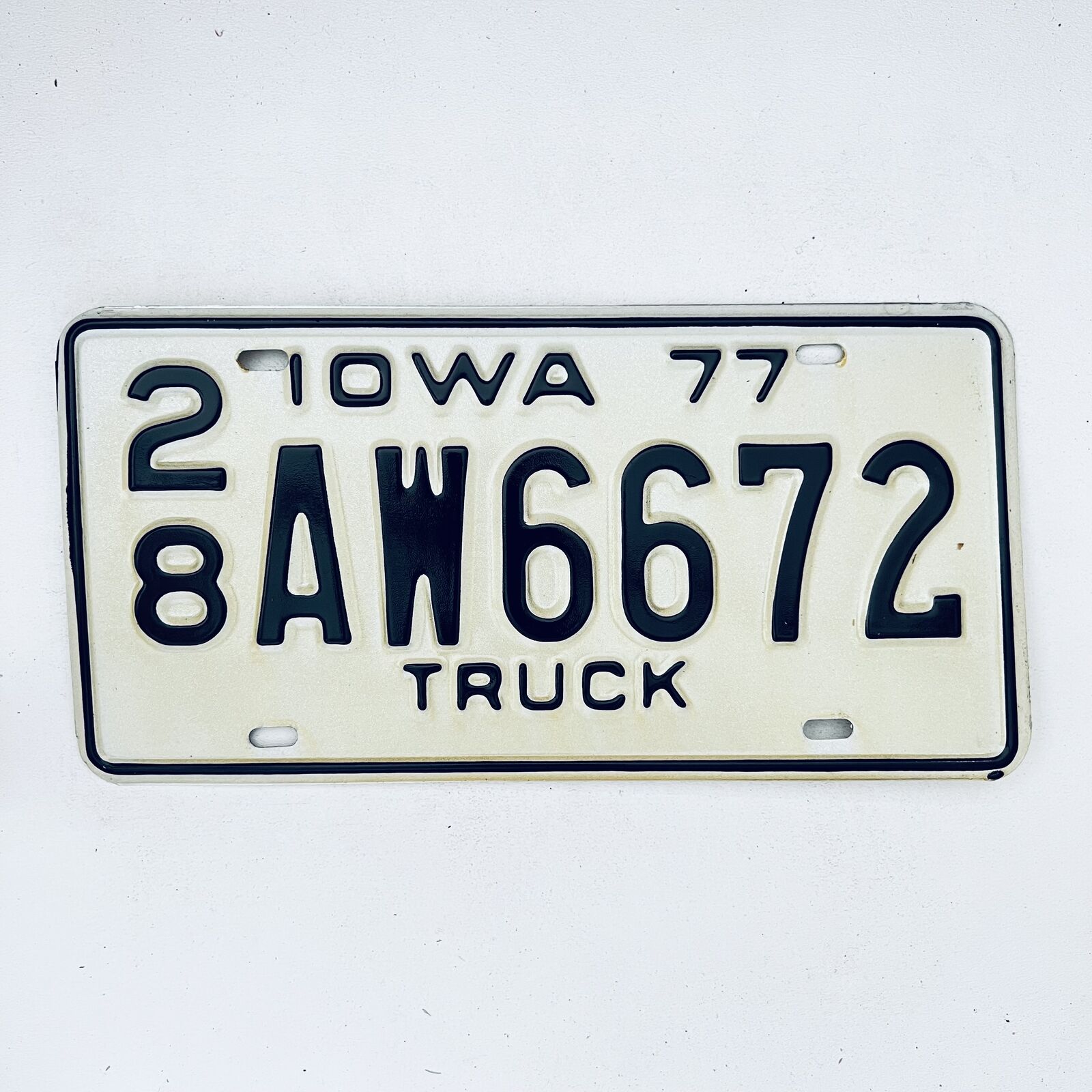1977 United States Iowa Delaware County Passenger License Plate 28 AW6672