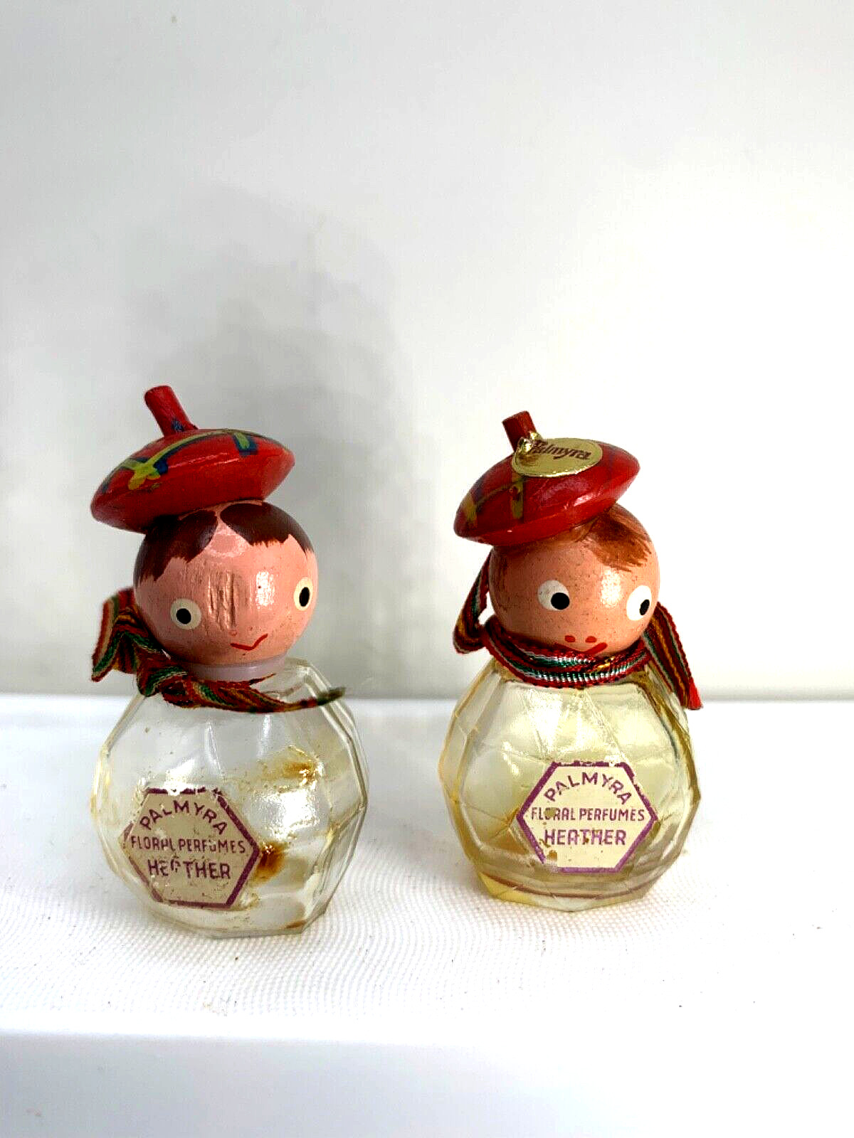 Cute VTG perfume bottles, 2 Scottish boys. Palmyra, scents by Olive Adair. ‘50s