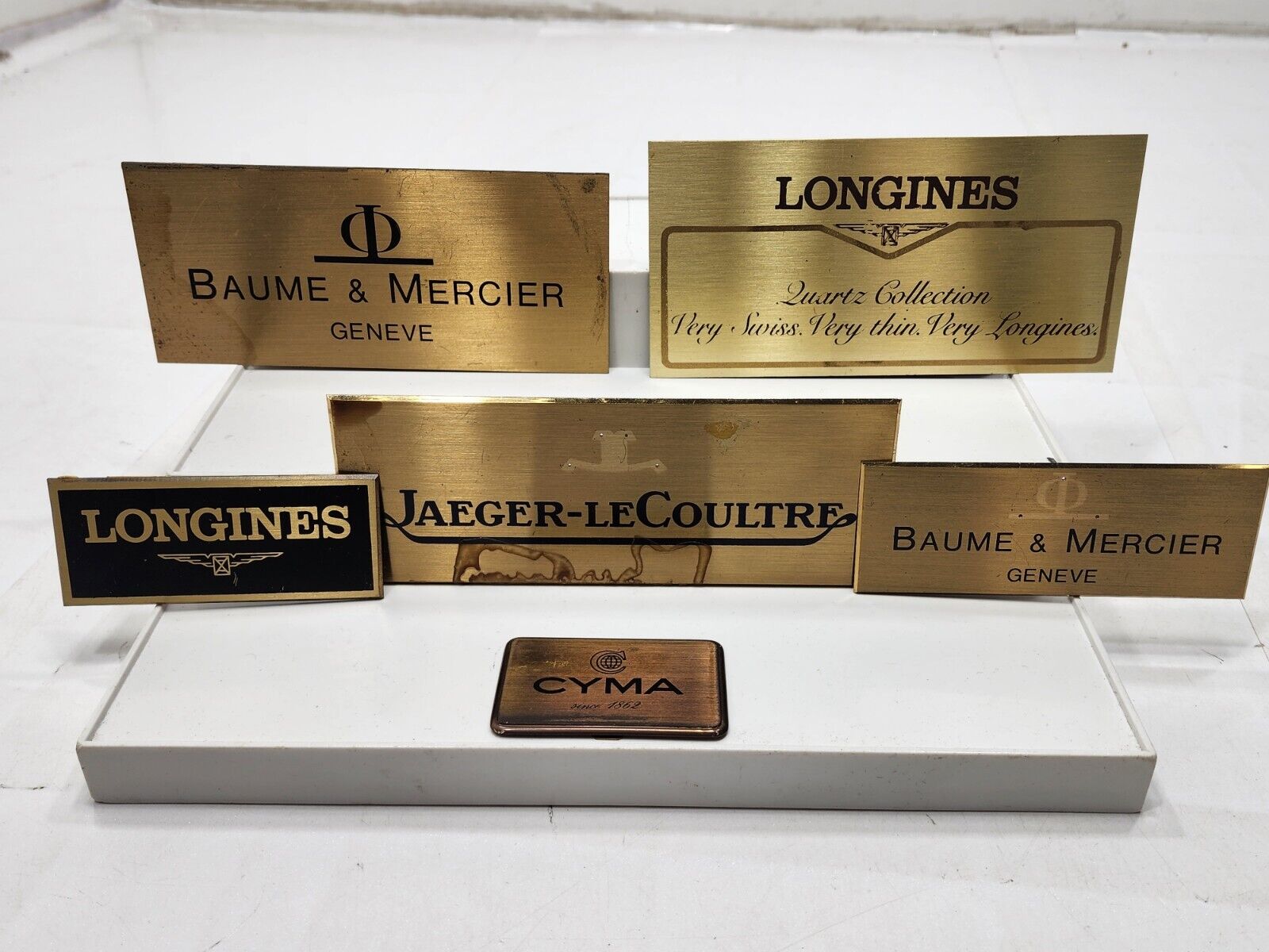 Vtg Baume Mercier, CYMA, Longines, and Jaeger-LeCoultre Store Display Case Signs