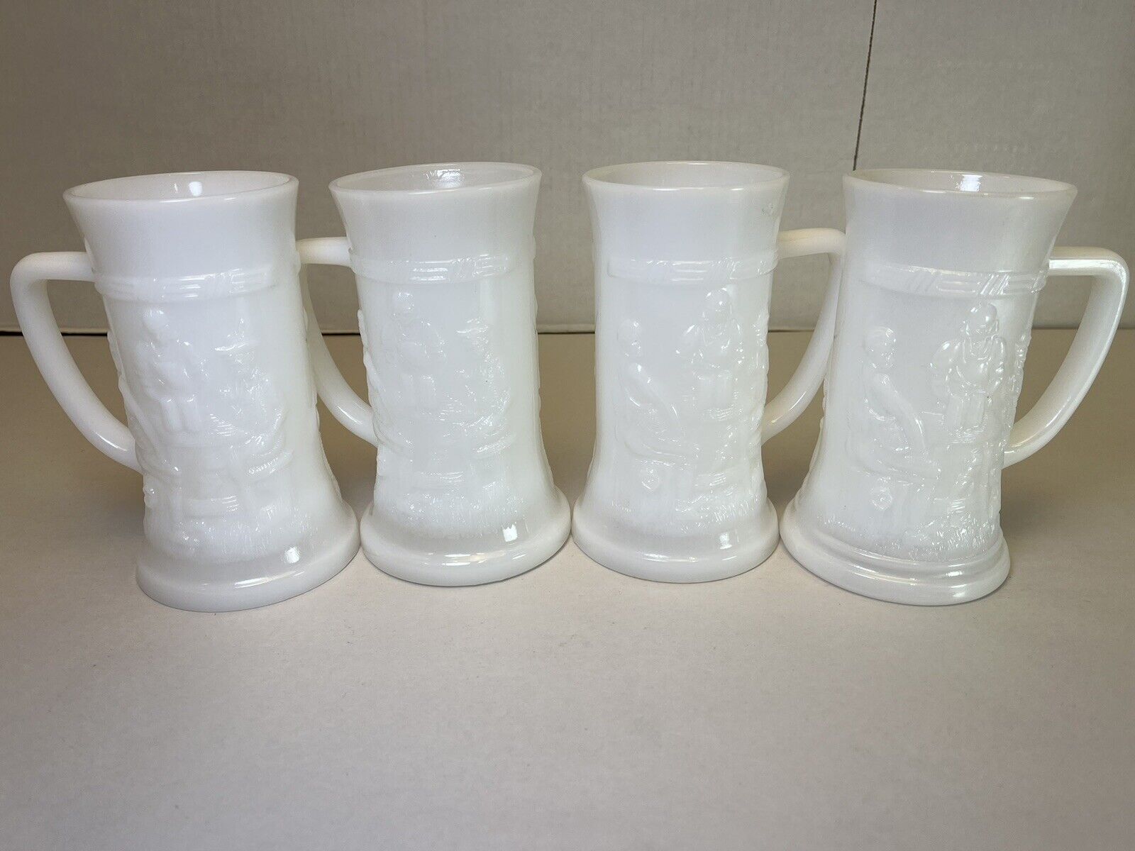 Vintage White Milk Glass Mugs Beer Steins Set of 4 Raised Pub Scene Tankard Cups