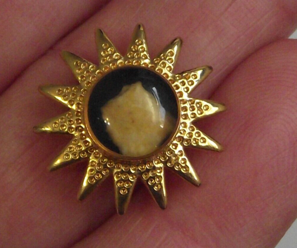 Holy Land relic stone sunburst gold tone small medal