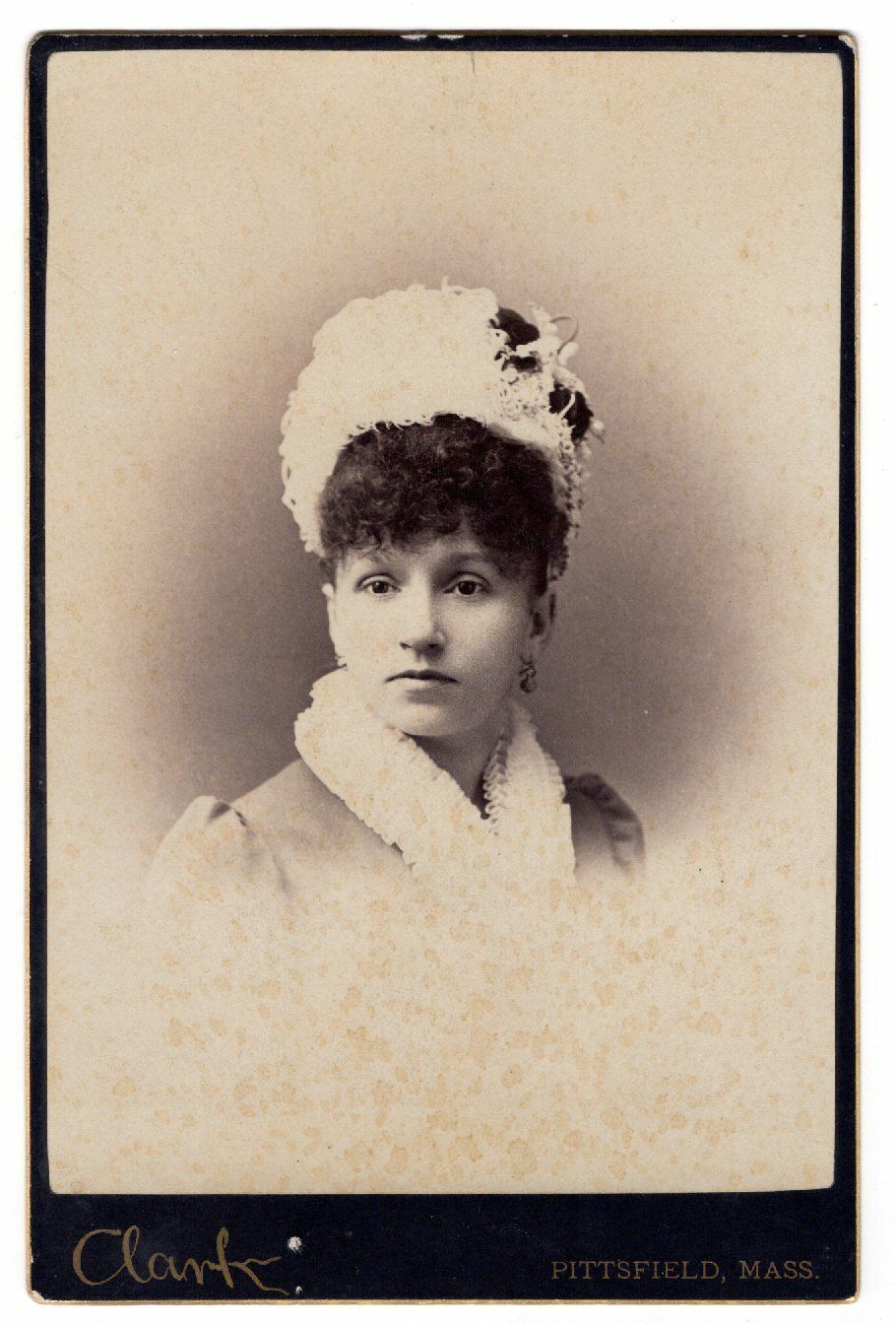 ATTRACTIVE WOMAN WITH A TALL FANCY HAT AND SCARF : PITTSFIELD, MASSACHUSETTS