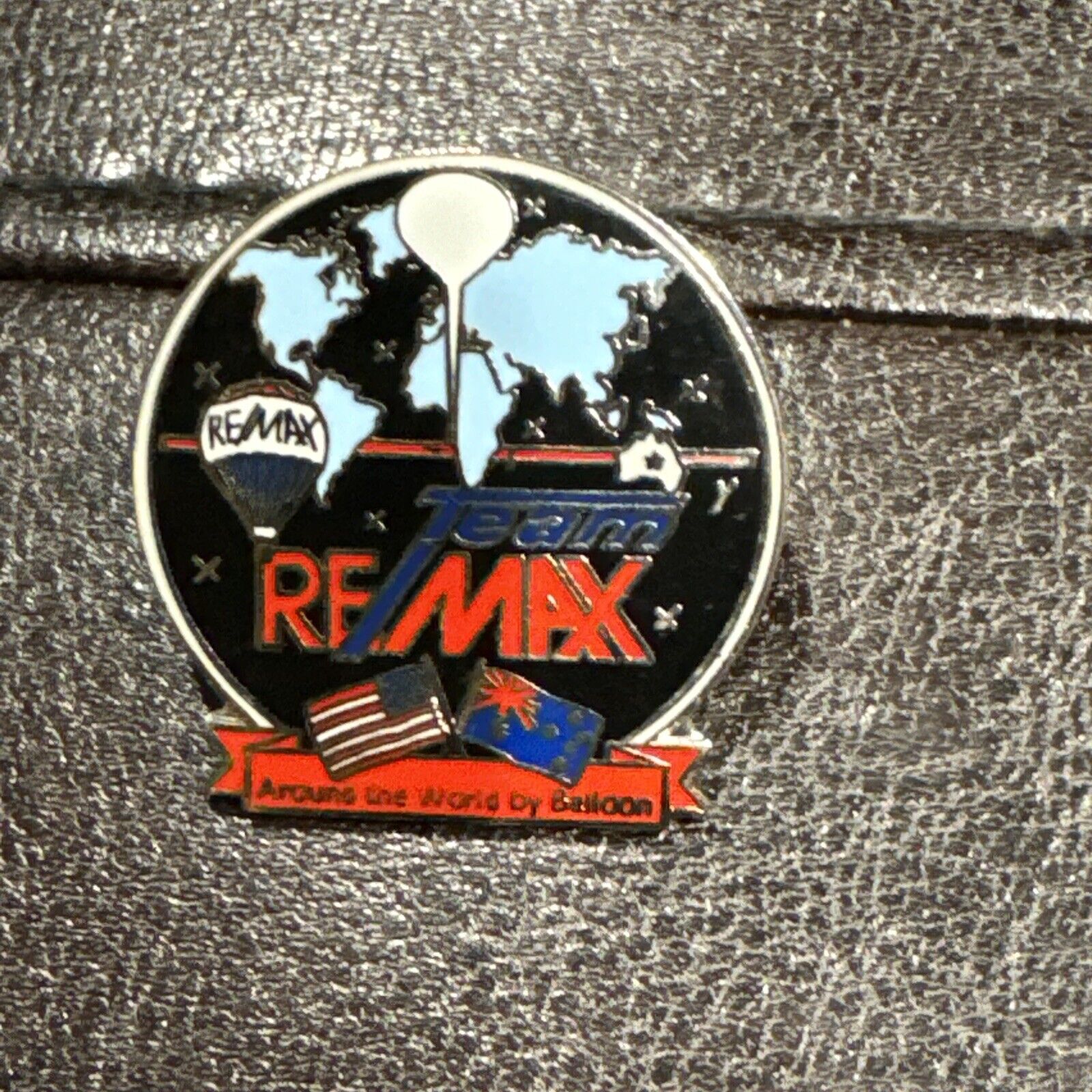 Team Remax Lapel Hat Pin Around The World In A Balloon With Flags