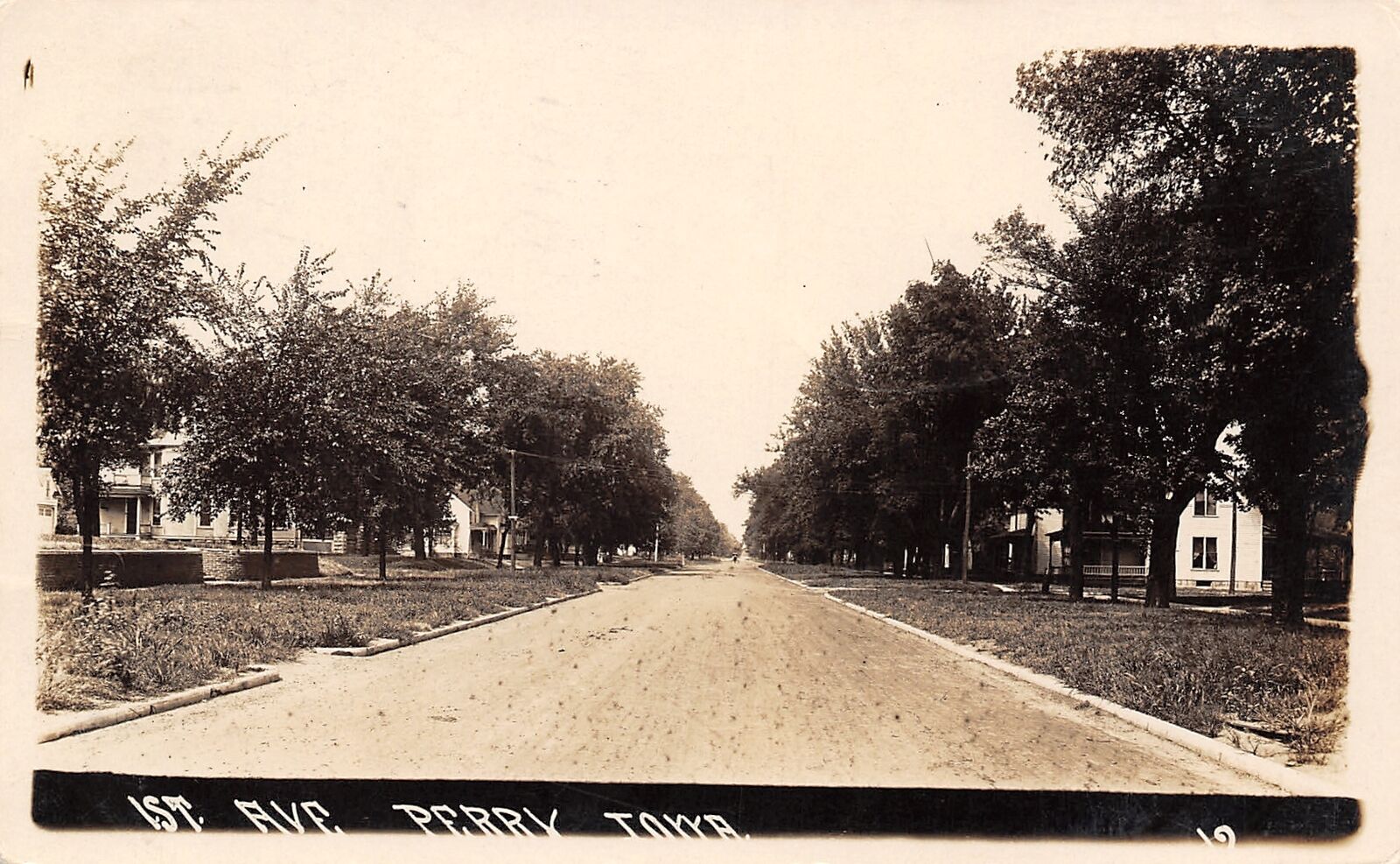 Perry Iowa~First 1st Avenue Homes~Wide Gravel Road~Arrived 11:27 Train~1912 RPPC