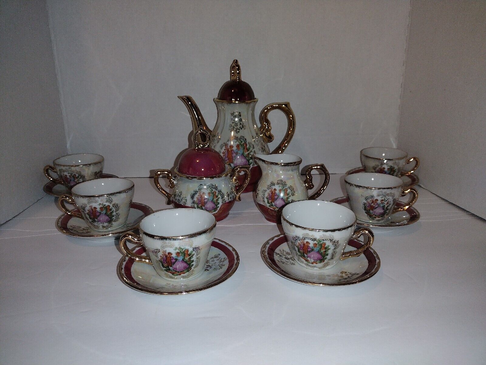 17PC Set Yusui 24KT.G.P.Featuring Courting Old Fashion Romance Tea Set For 6