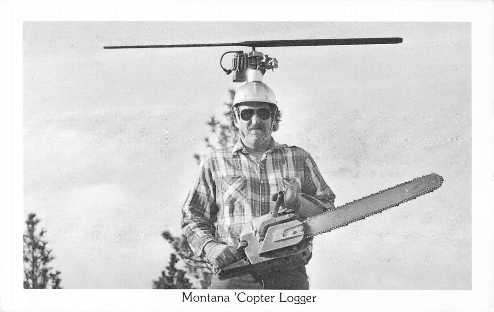 Montana \'Copter Logger Postcard Helicopter Blades on Hard Hat Man with Chainsaw 