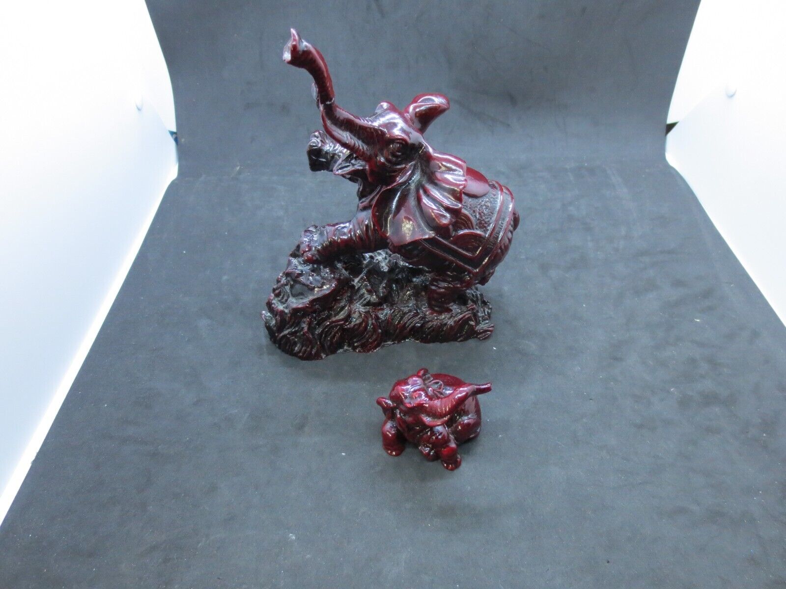 2 Vintage Hand Carved Deep Red Resin Elephant Figurines with Trunks Up for Luck