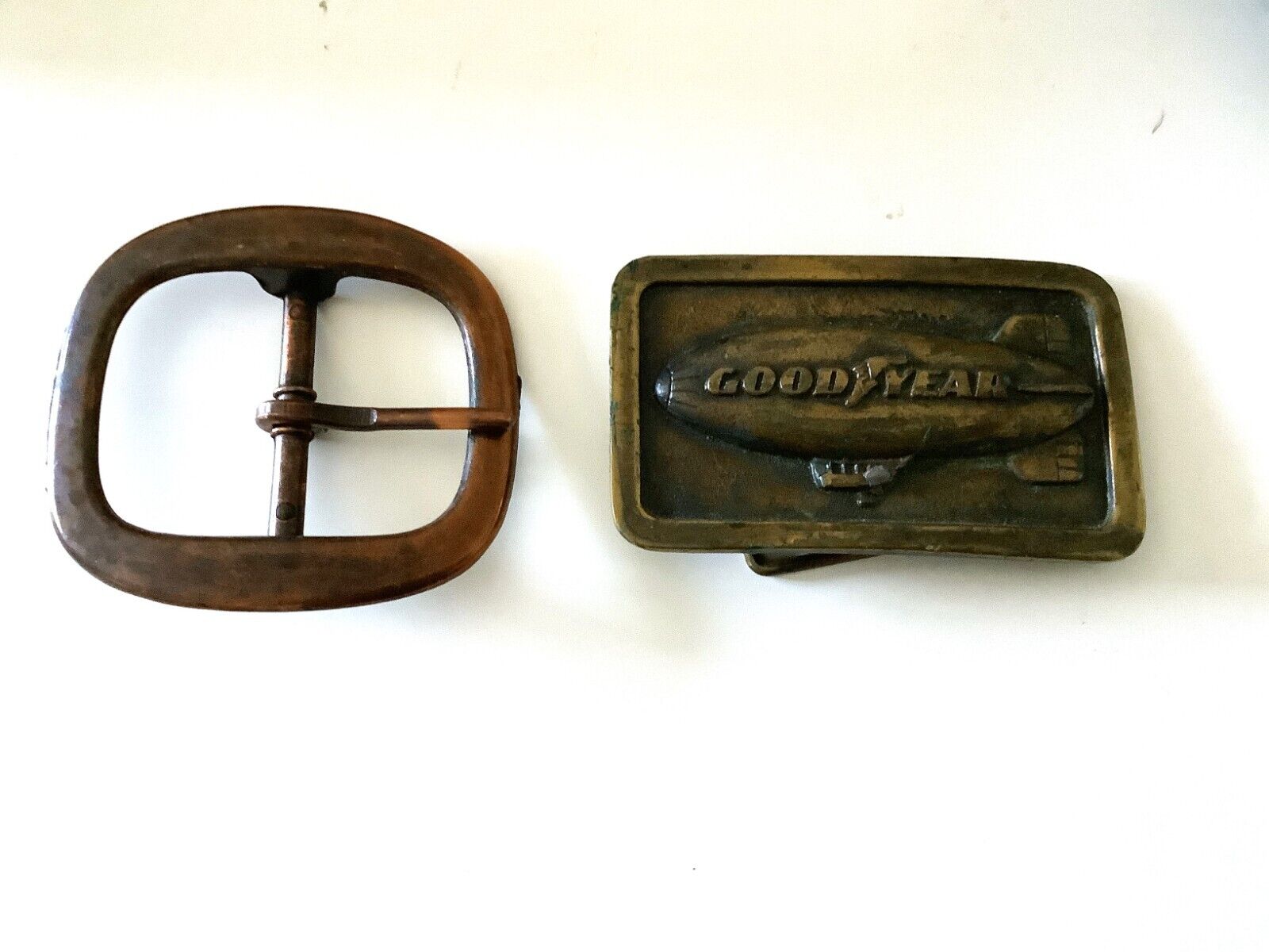 Lot of 2 VINTAGE BELT BUCKLE- 1970’s THE GOODYEAR (BLIMP) TIRE & RUBBER CO.