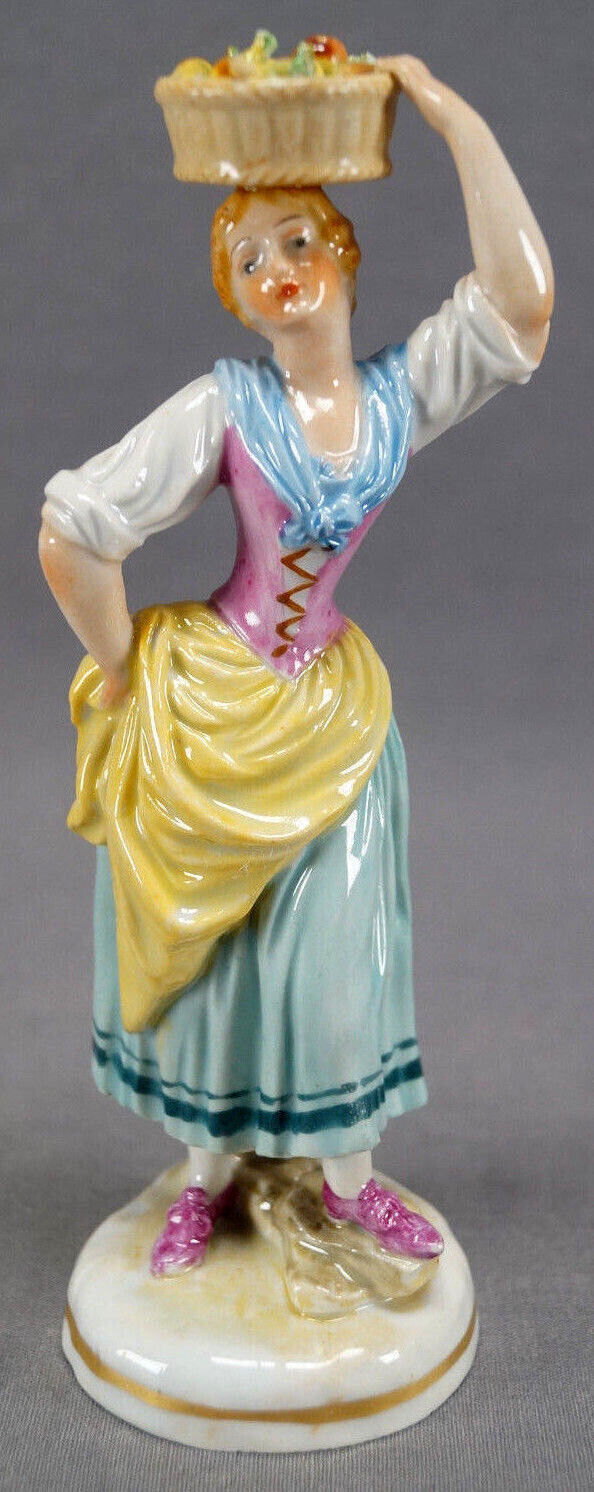 Early 20th Century Dresden Hand Painted Turnip Seller Female Porcelain Figurine