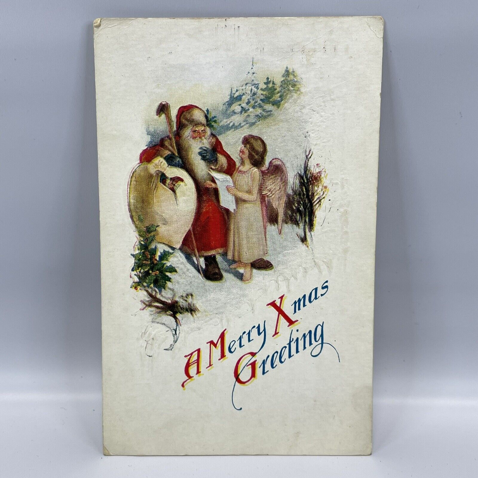 1923 Santa Claus w/ Walking Stick Brown Fur Trim Hat Angel Christmas Postcard