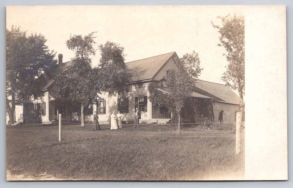 eStampsNet - RPPC ca 1910 Farm House with Family Outside Postcard 