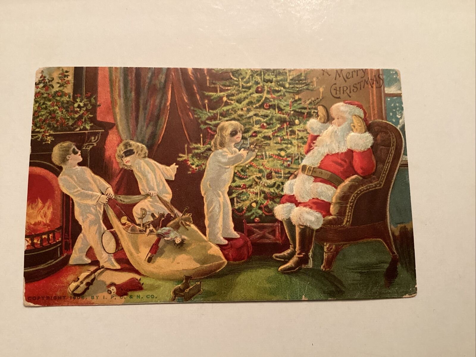 Antique 1912 Postmark IPC&N Co Postcard Christmas Santa Embossed 1906 Copyright