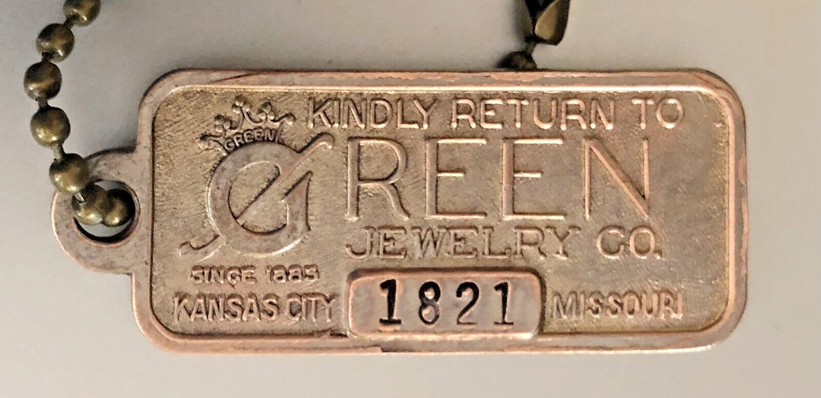VTG Charge Coin Tag: GREEN JEWELRY CO; Kansas City Missouri; #1891