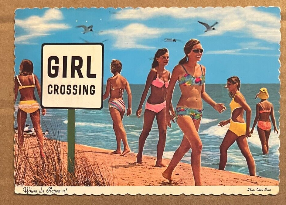 c1968 - 1974 USED POSTCARD - GIRL CROSSING, WHERE THE ACTION IS