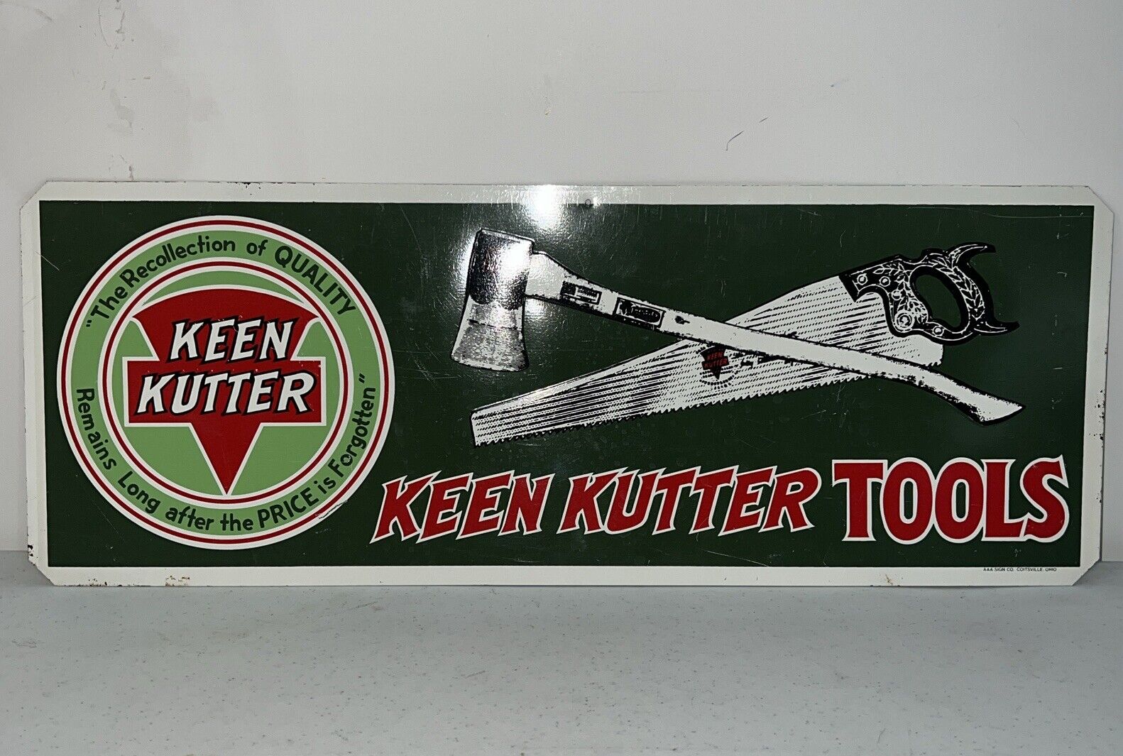 Vintage 1980’s Keen Kutter TOOLS Metal Embossed Sign With Axe And Hand Saw