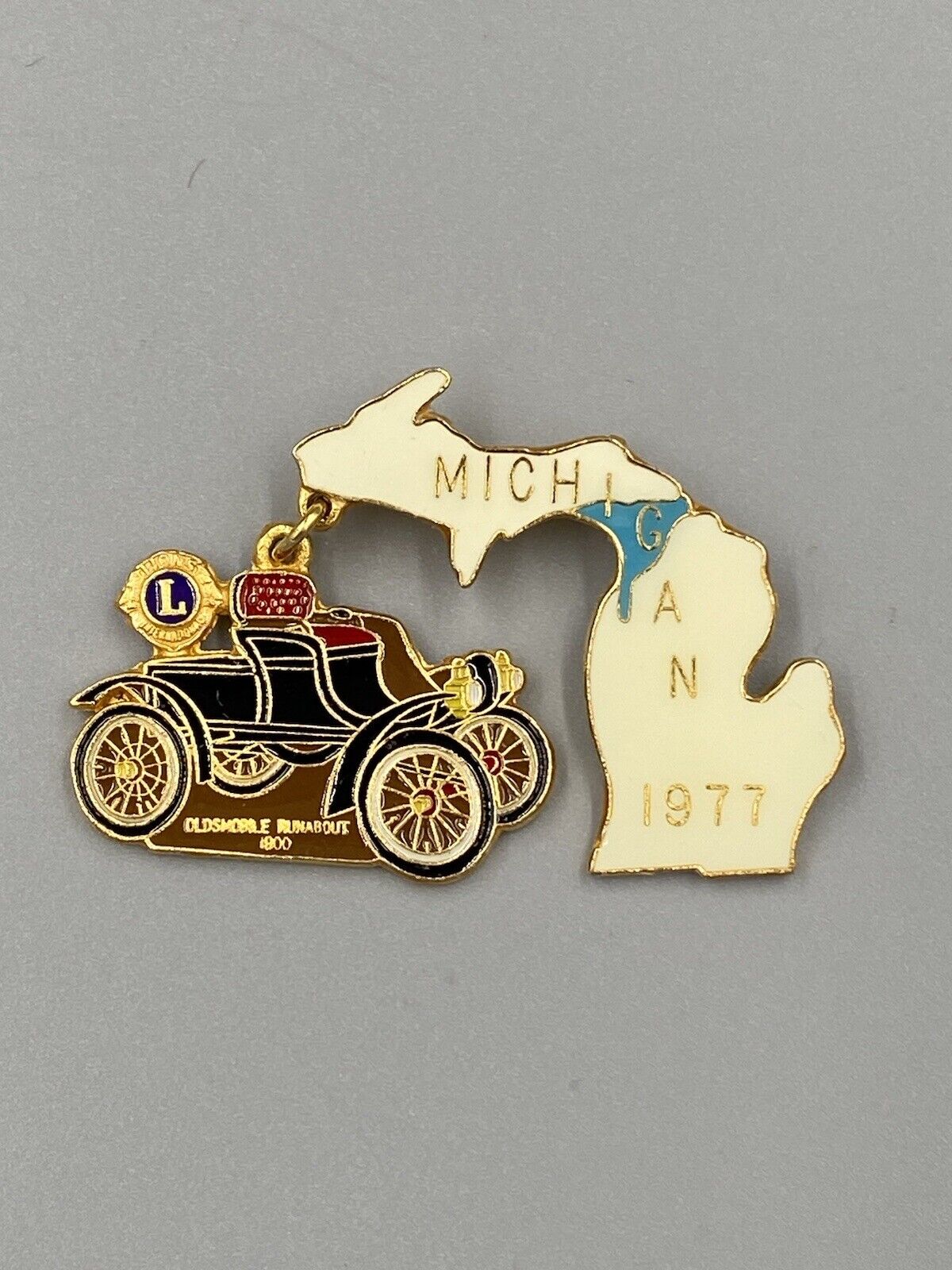Vintage Lions Club Michigan 1977 Oldsmobile Runnabout Lapel Pin Brooch