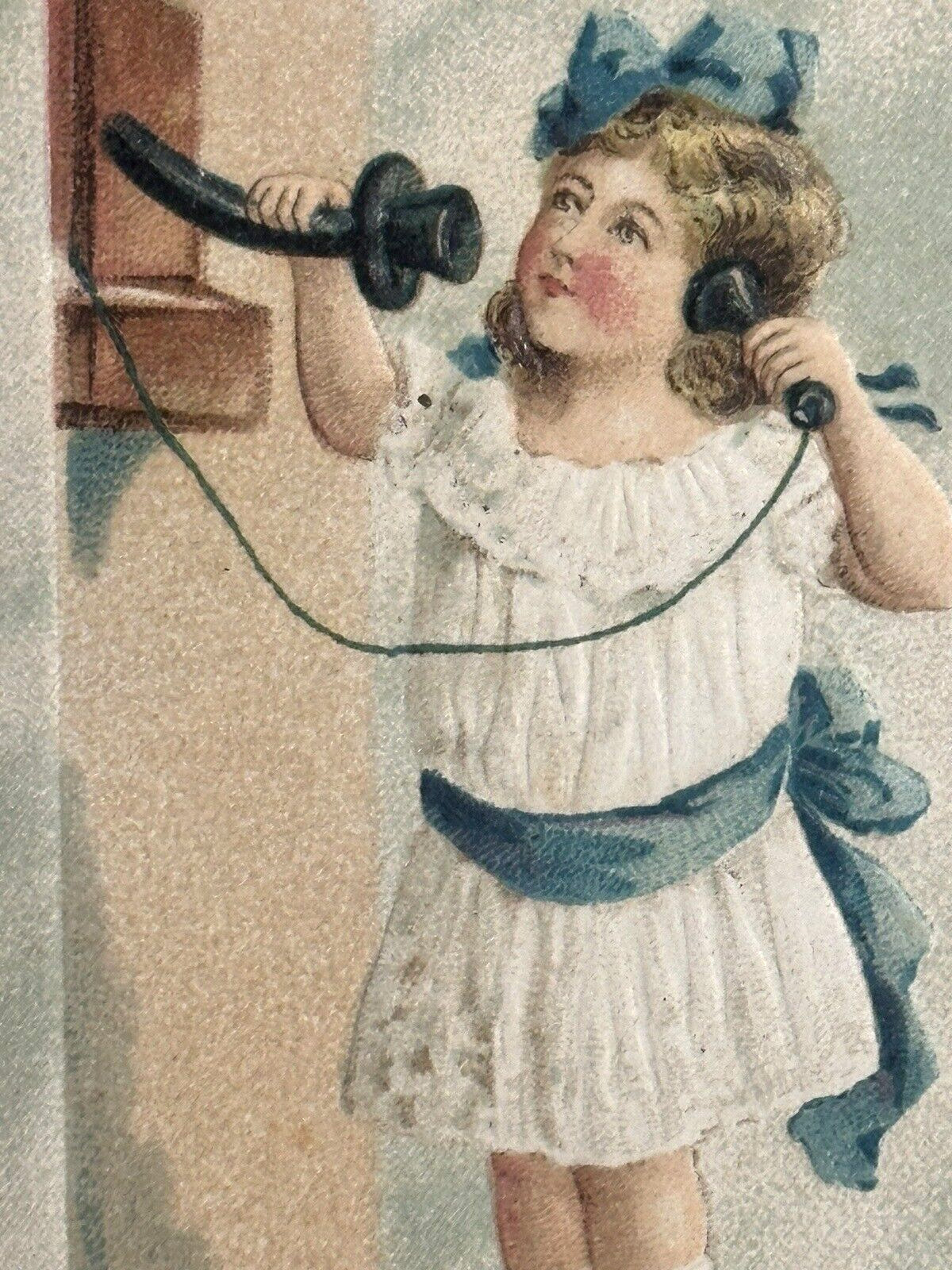 Christmas Postcard Girl Telephone Call Footstool Jolly Merry Wish Holly Garland