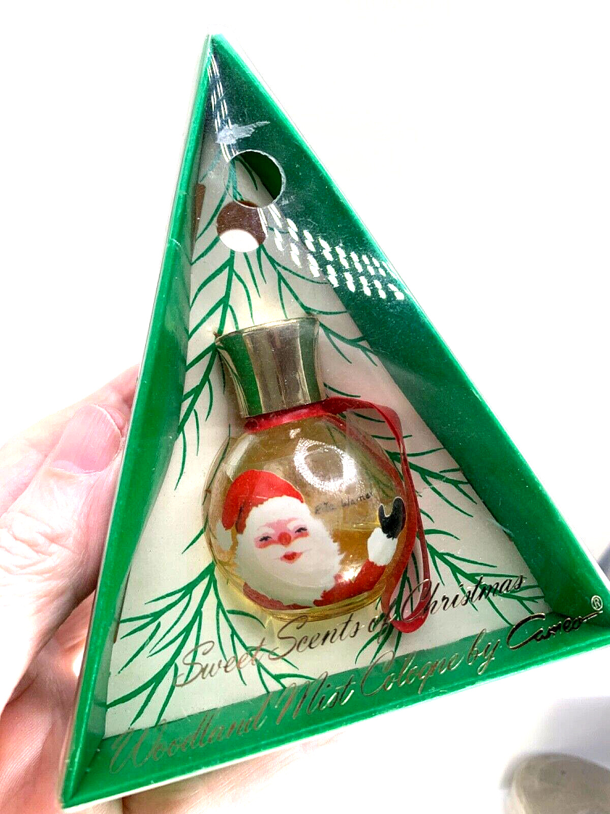 Darling   Vintage Christmas perfume bottle.  Woodland Mist by Cameo.    1/2 oz.