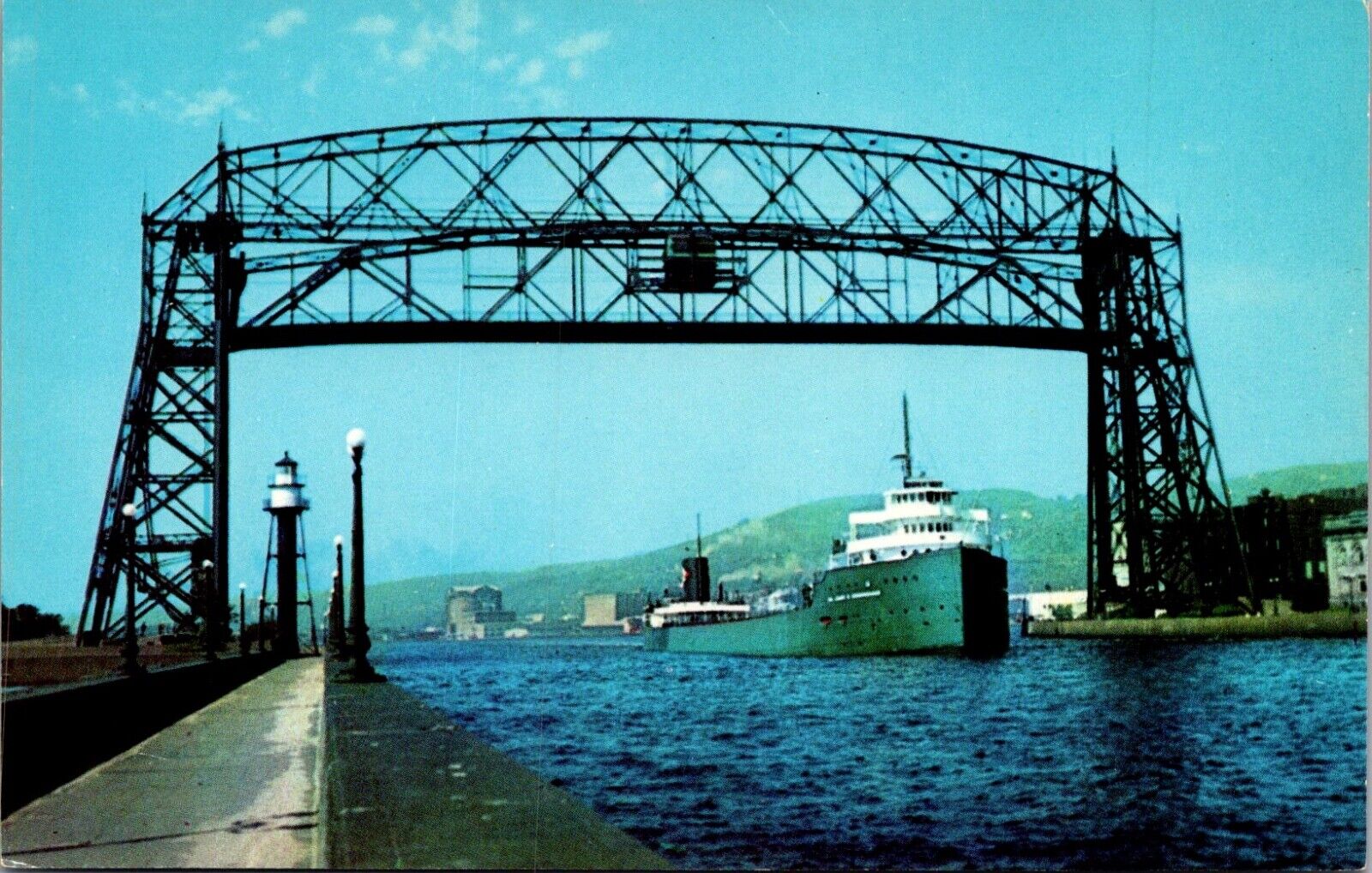 Postcard Duluth Minn. Giant Freighter Leaving Duluth Superior Harbor Aerial Lift
