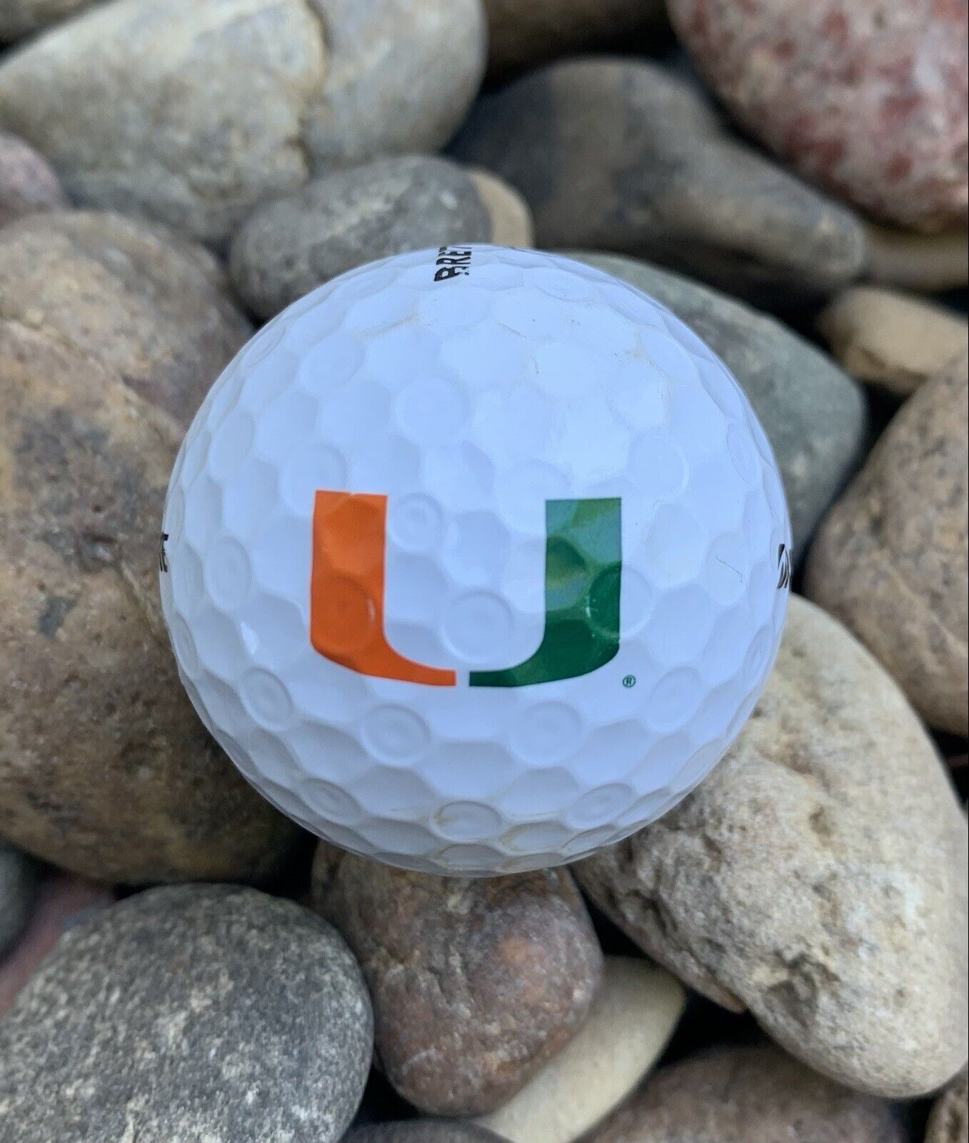 University of Miami Logo Golf Ball.  Good conditioned. Bridgestone  