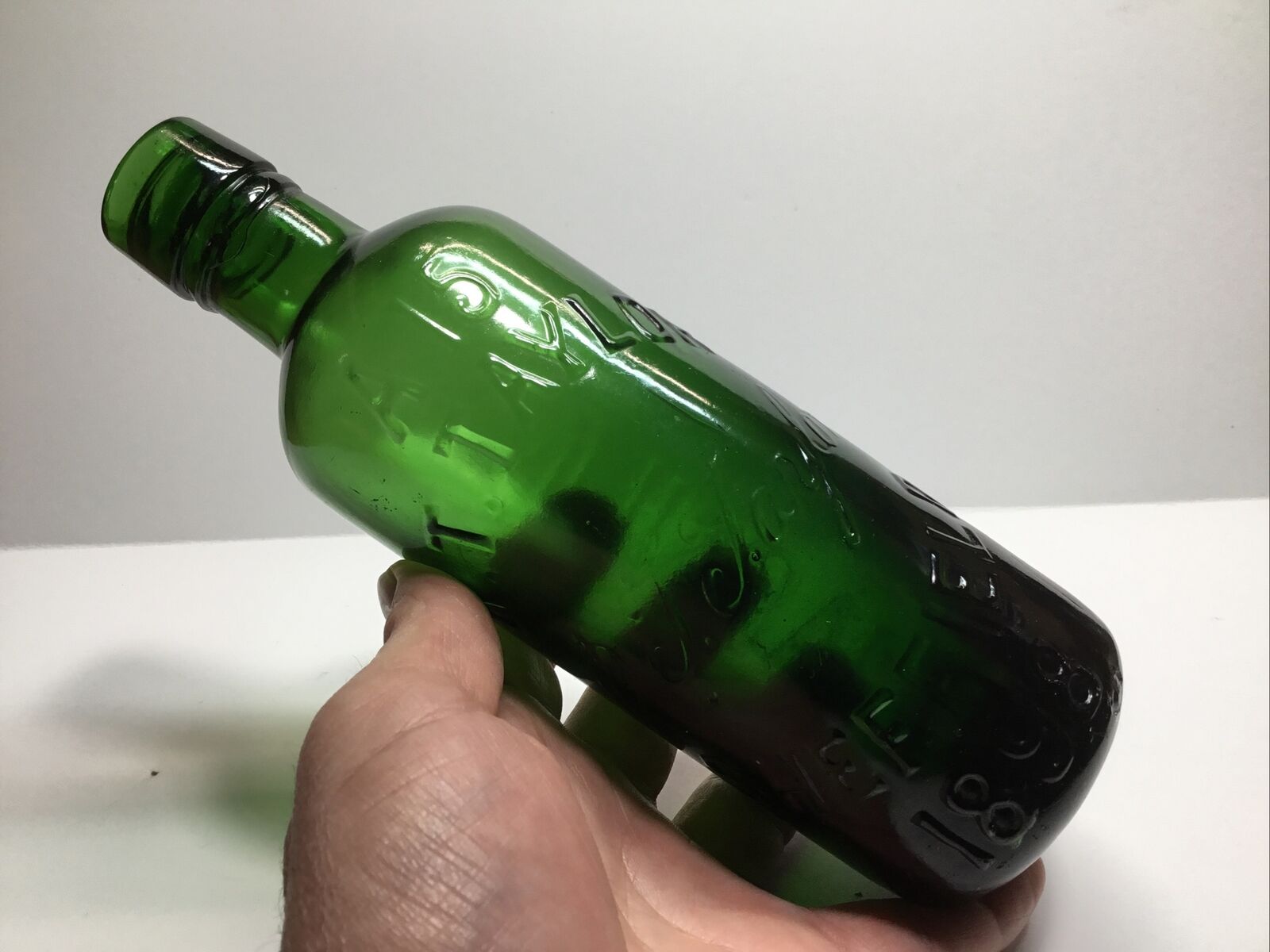 Antique R. T. Taylor Emerald Green Magnums Beer Bottle.