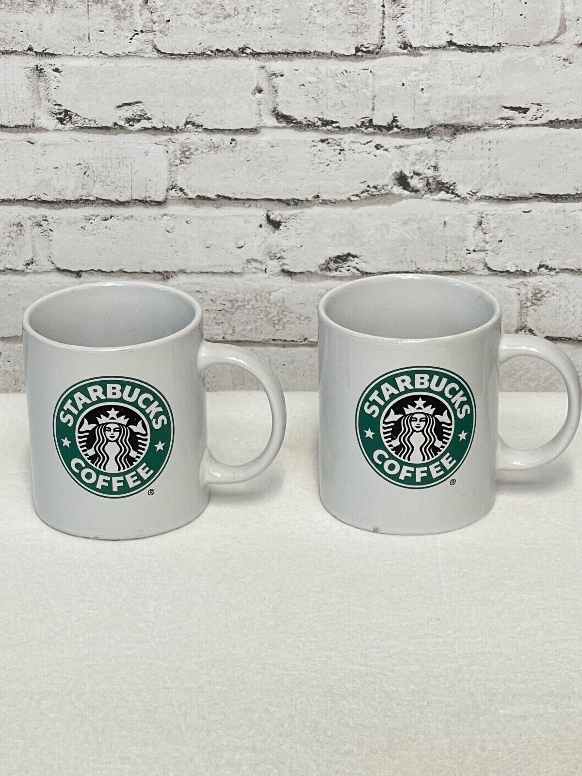 Starbucks Coffee Company 2008 Pair of Mugs Coffee Cups White Black Green Logo
