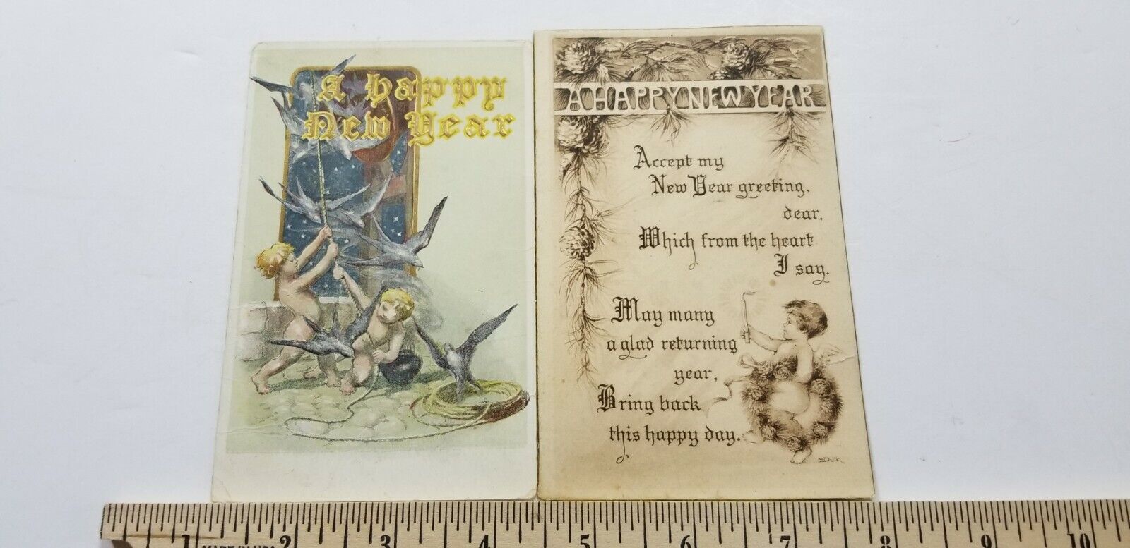 LOT OF TWO Antique 1908 HAPPY NEW YEARS POSTCARDS Embossed CUTE CHERUBS A4