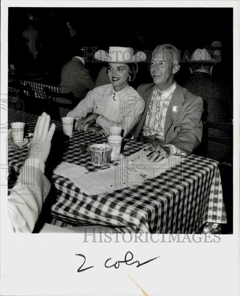 1961 Press Photo John and Ruth Cook, Grand Prize Beer executive, at party.