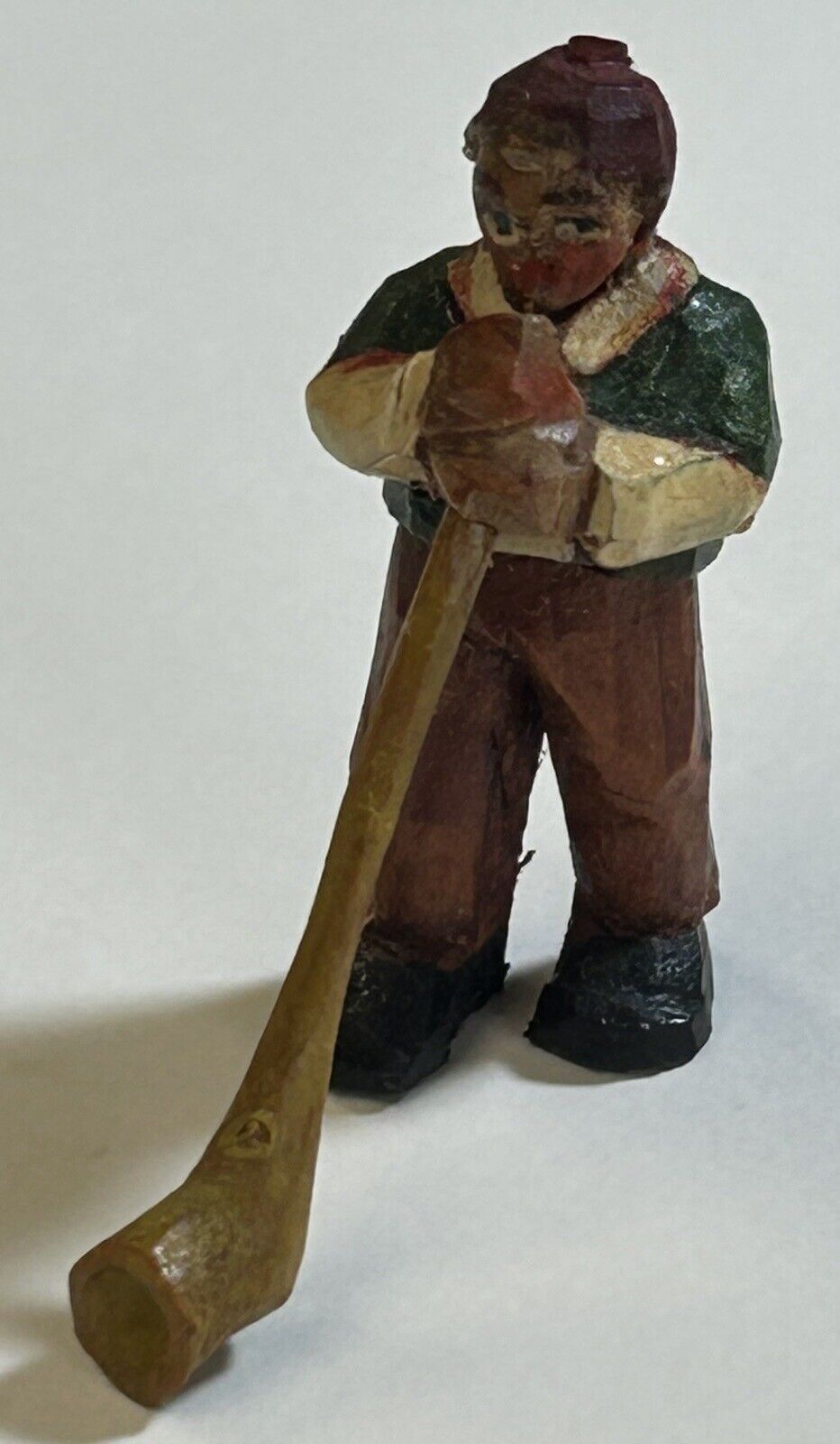 Antique Miniature Hand Carved Wooden Man Blowing Swiss Horn, 1 1/2”