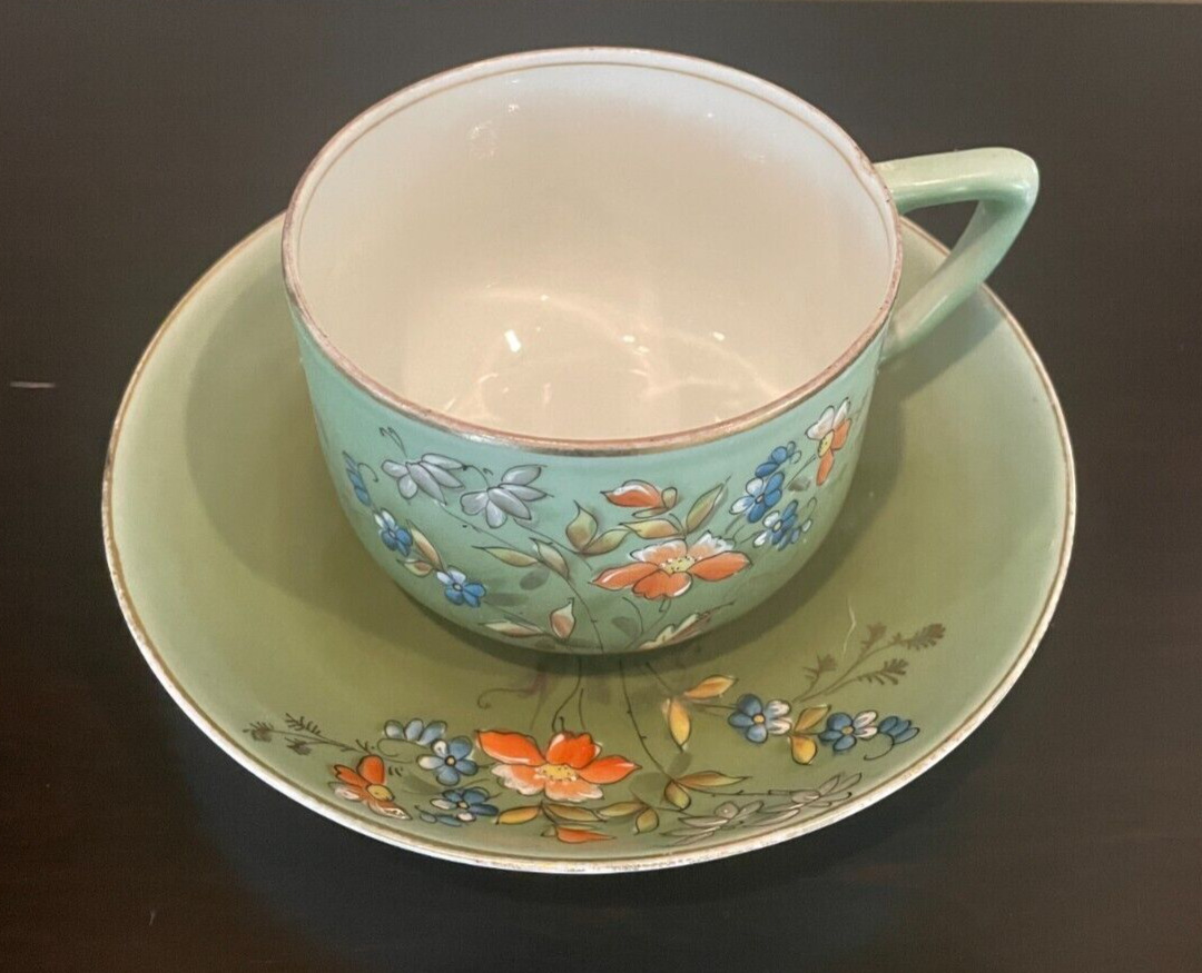 Kuznetsov Russian Imperial Factory Hand Painted Flowers Gilt teacup/saucer
