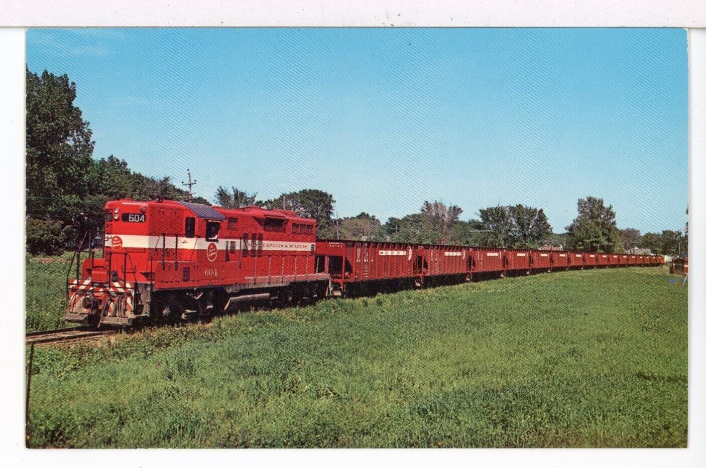 1950s  Minneapolis & St. Louis RR GP9 #604 and Hoppers, Marshalltown IA Postcard