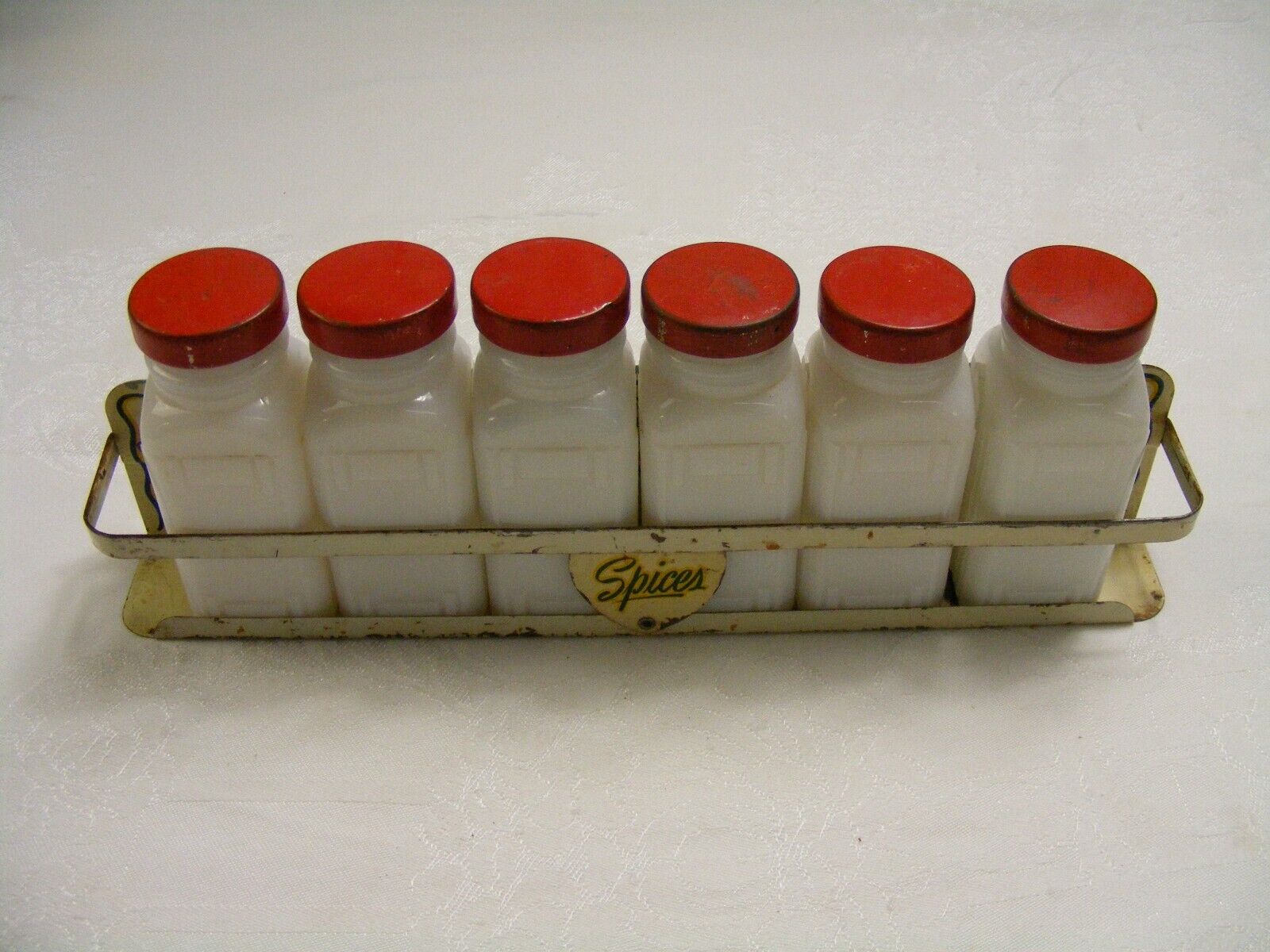 Vintage Griffiths Metal Spice Rack w/Wall Holder 6 Milk Glass Bottles w/Red Lids