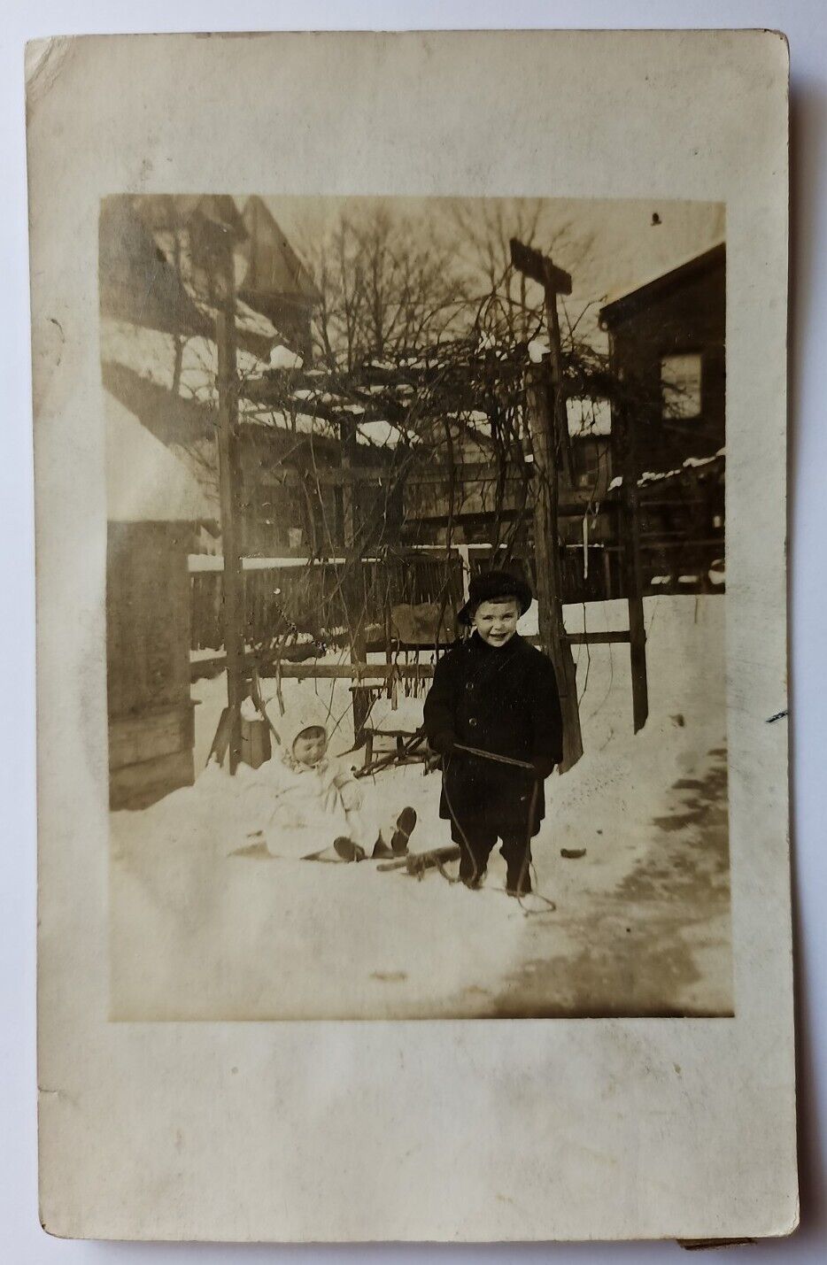 1907-1920s RPPC Girl Sledge & Boy Winter Snow Christmas Antique Postcard
