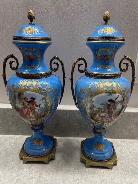 PAIR  FRENCH  SEVRES HAND PAINTED PORC. URNS, GILDED BRONZE, 19C. OLD MARKINGS