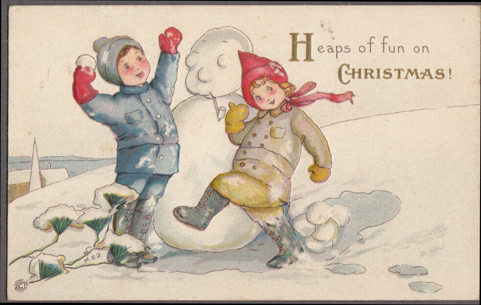 Kids build snowman & make snowballs Heaps of fun for Christmas postcard ca 1910