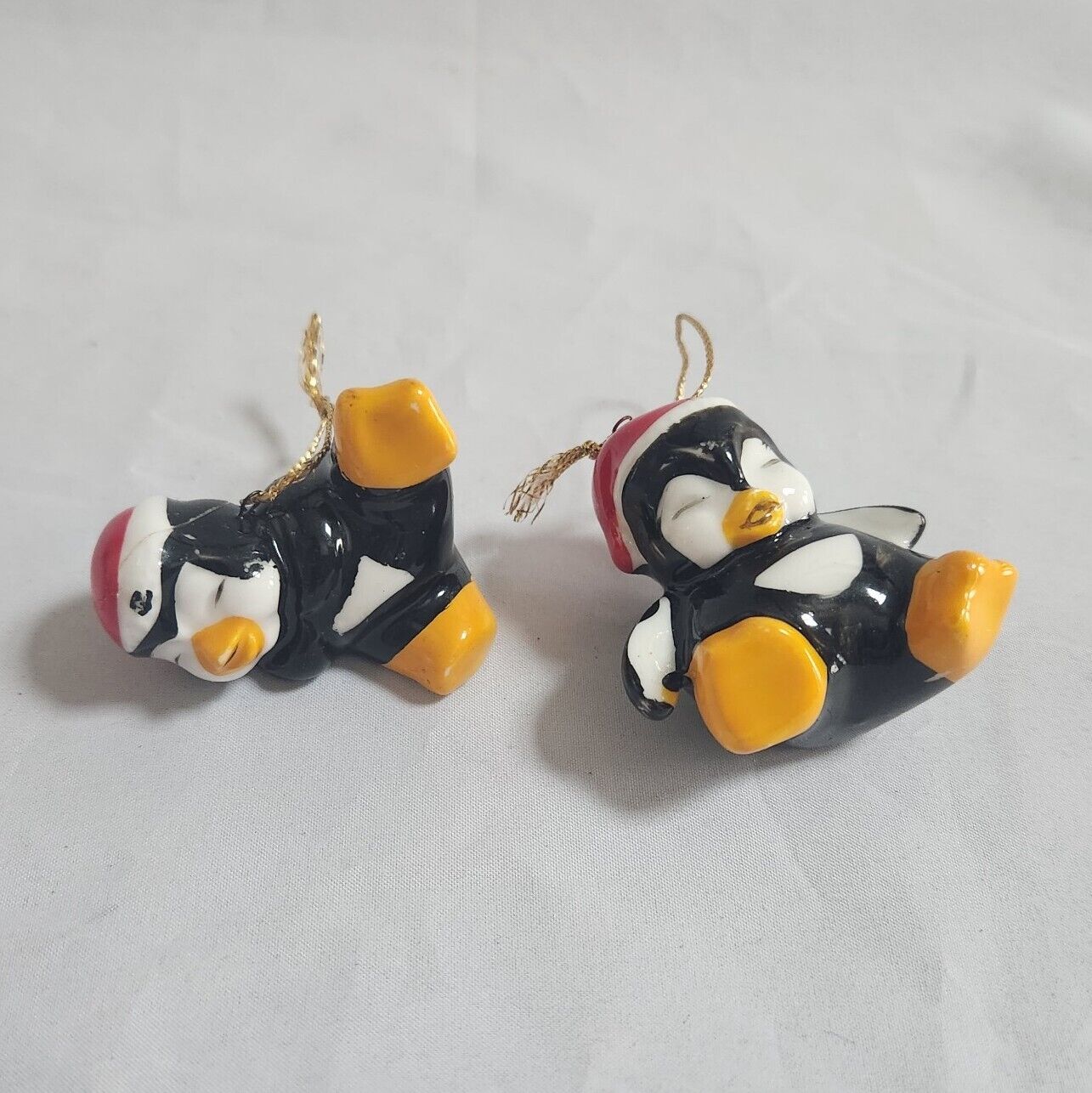 VTG Pair Tumbling Laughing Penguin Figurine Santa Hat Christmas Ornament AS IS