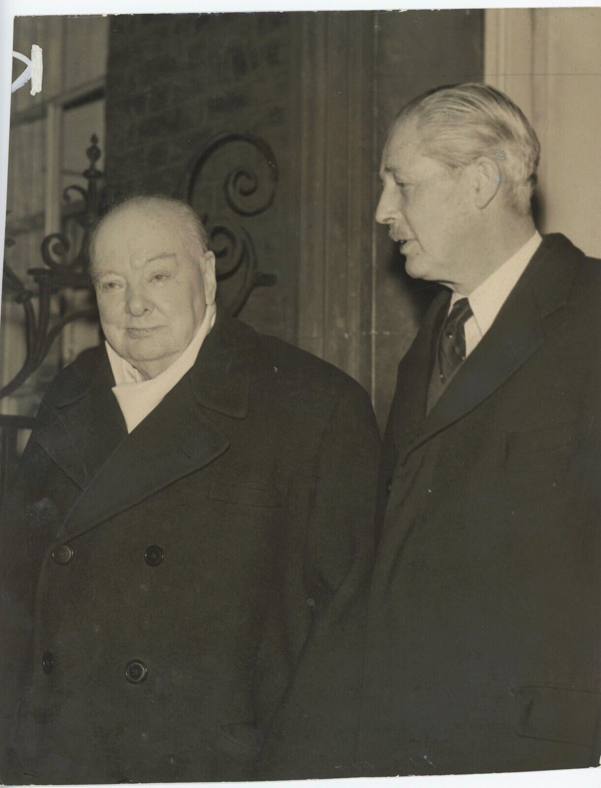 13 December 1957 press photo of Sir Winston S. Churchill with Harold Macmillan
