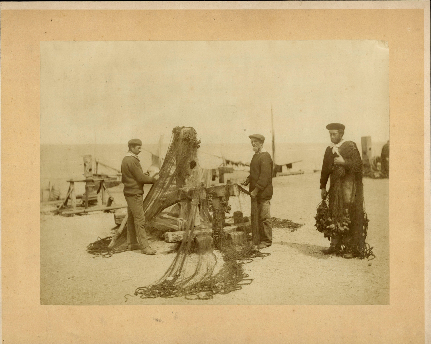France, Étretat, fishermen repairing their nets, ca.1875, vintage albumin print