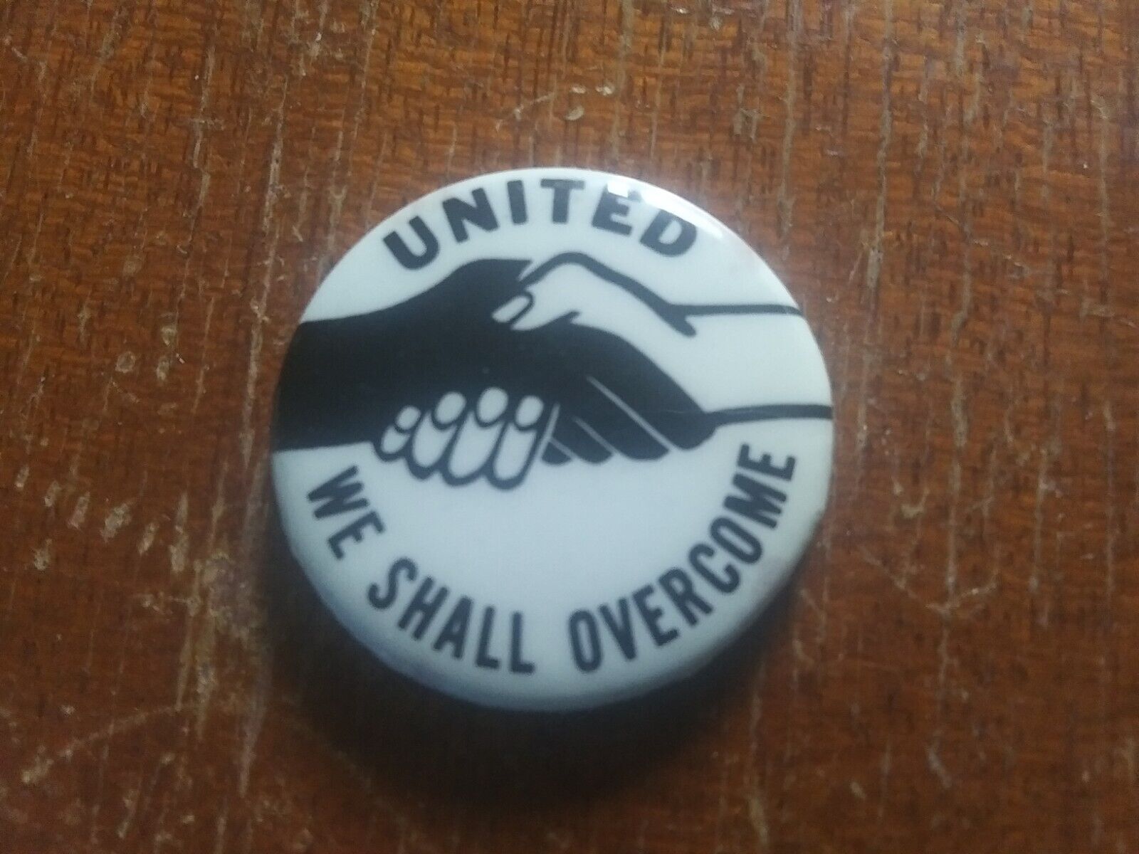 1960s United we shall overcome Pin Back Button handshake civil rights cause *