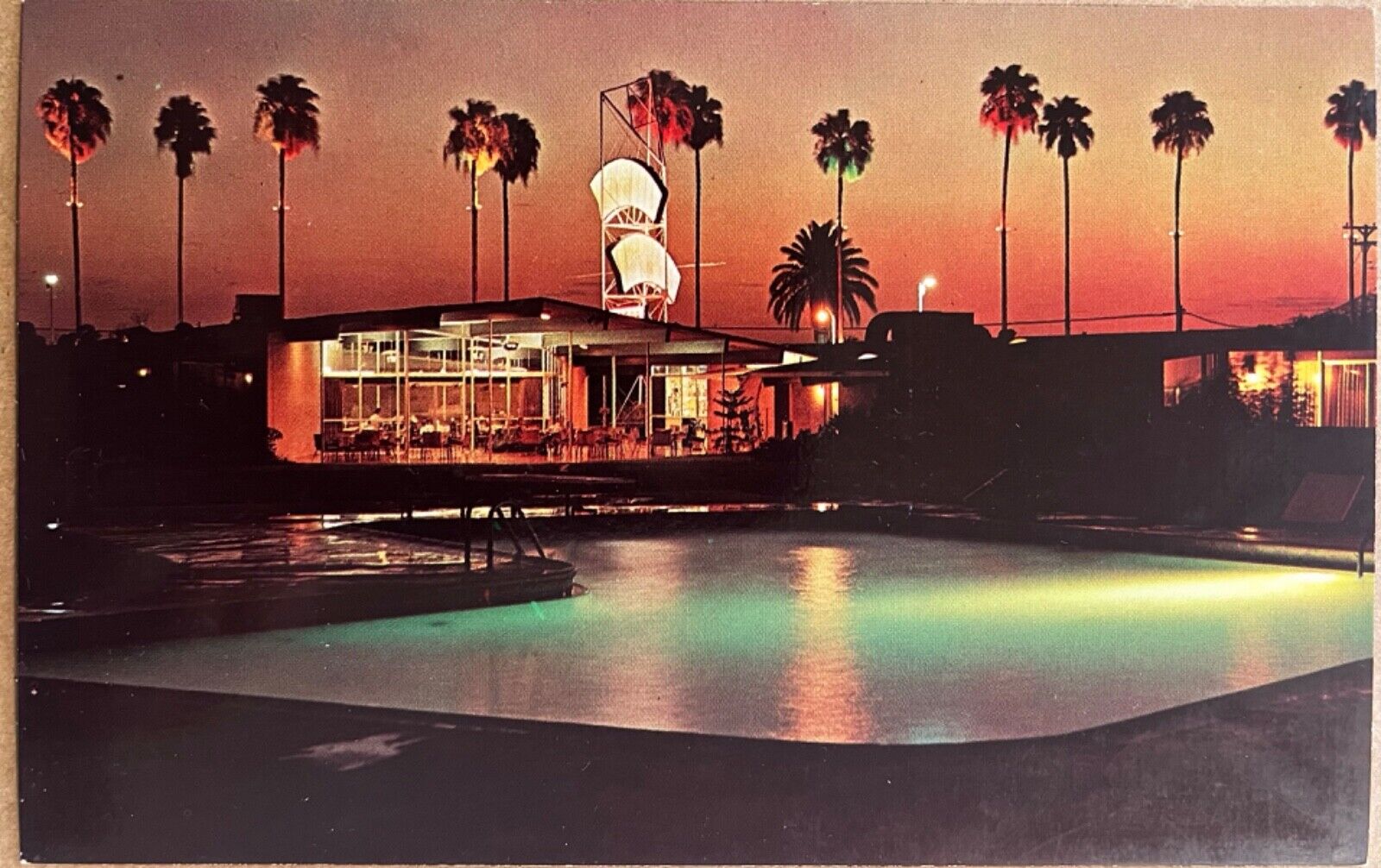 McAllen Texas Fairway Motor Hotel Motel Sunset Night View Postcard c1960