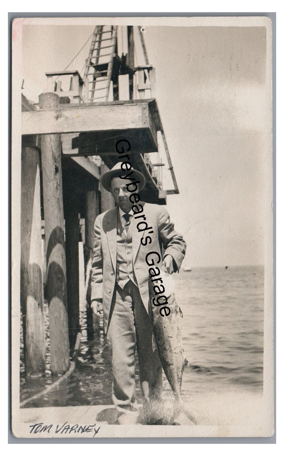 RPPC Man in Suit Fishing, Caught Fish Pier LOS ANGELES CA Real Photo Postcard