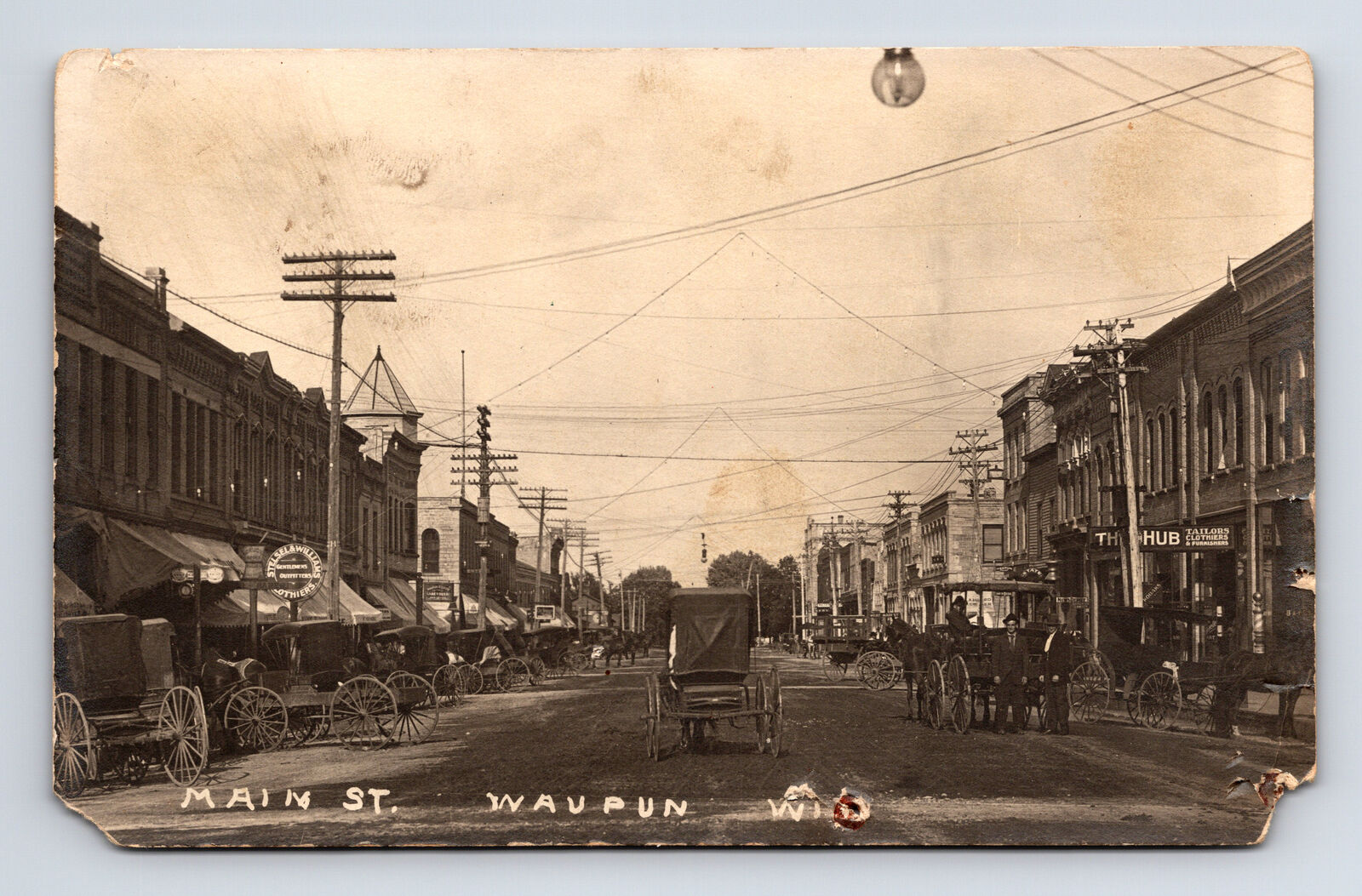 RPPC Main Street People Horse Carriages Barber Pole Waupun Wisconsin WI Postcard