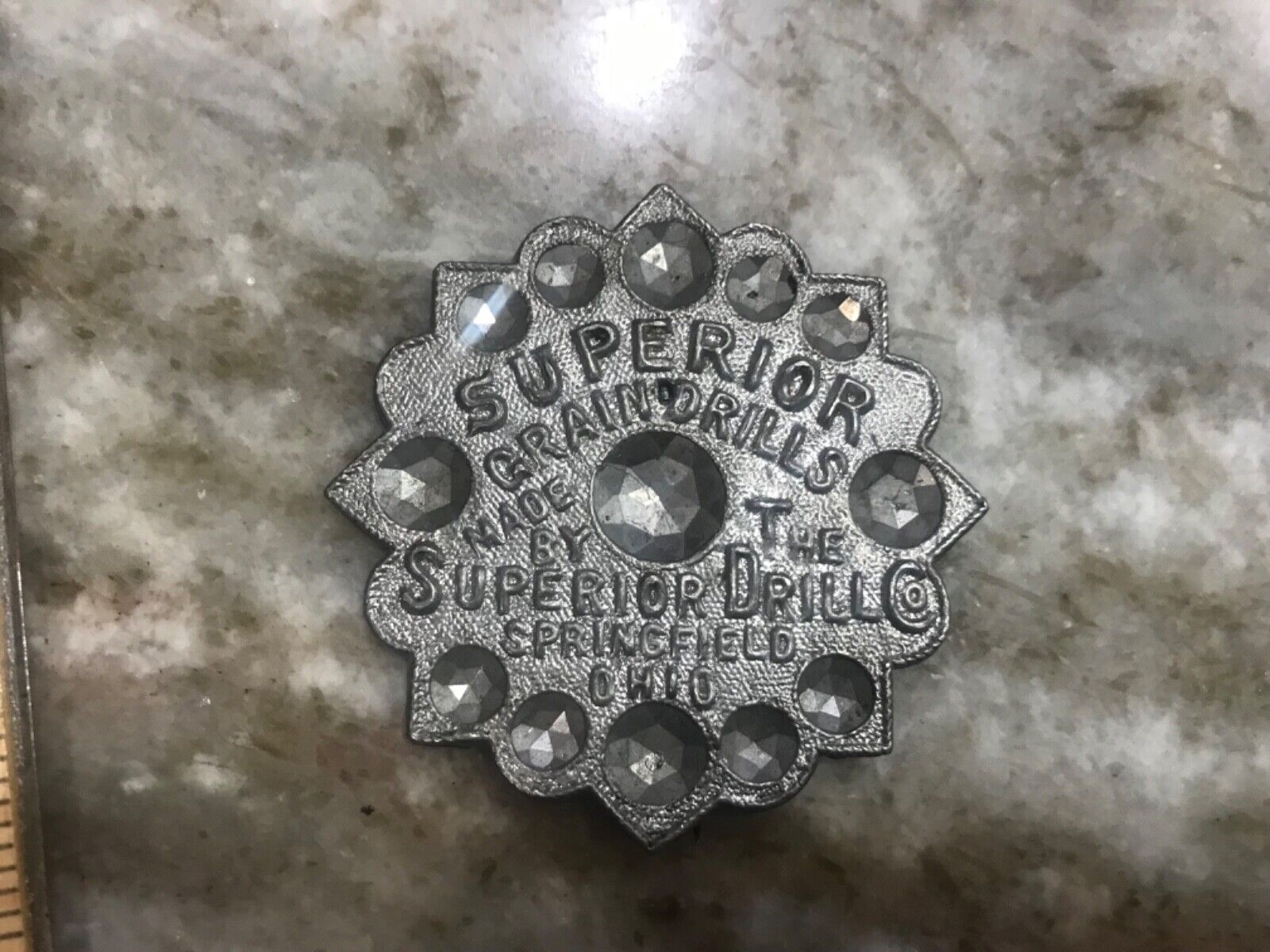 Early 1900’s metal badge .Superior Grain Drills, Springfield OH ..