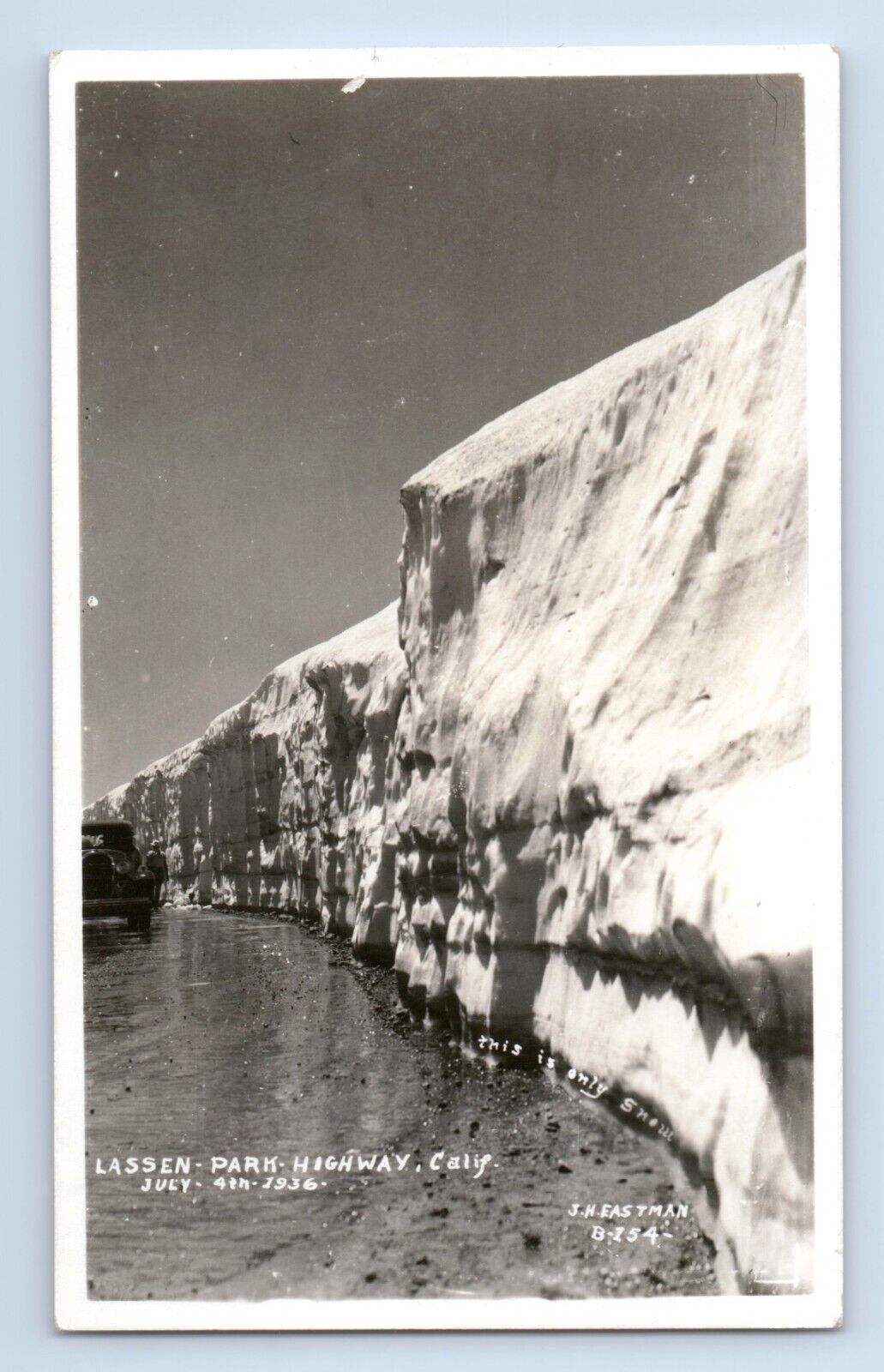 c.1936 RPPC Deep Snow Wall Lassen Volcanic National Park Highway CA 4th of July