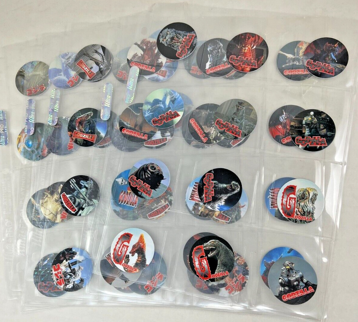 GODZILLA POGS from JAPAN 1995 Complete Set of 55 Some are Prism