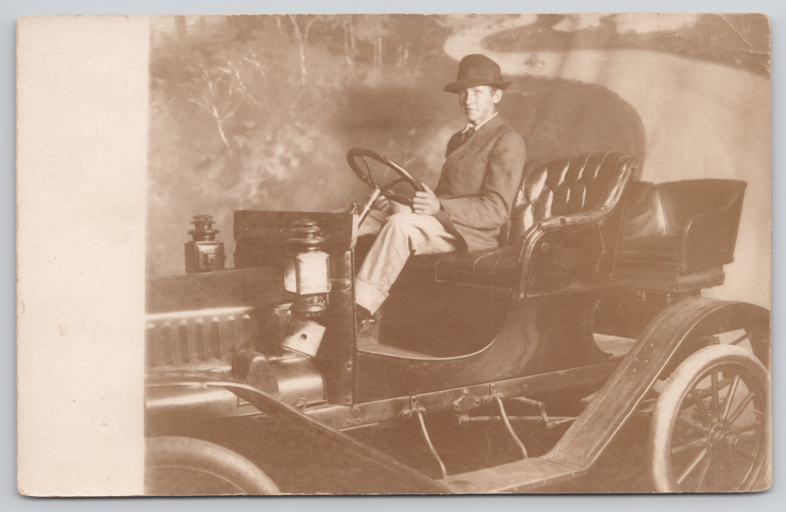 RPPC Boy in Suit Sitting in Car in Studio Unposted c1905 Real Photo Postcard