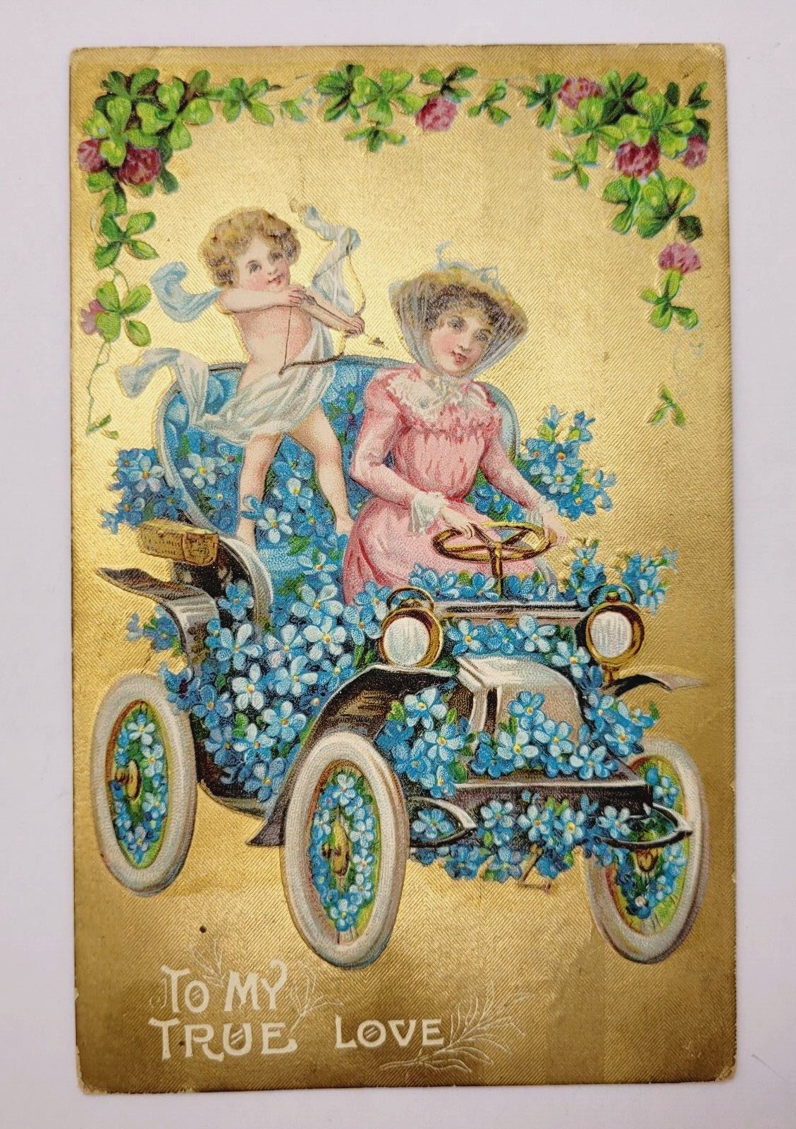 Antique 1909 Valentine To My True Love Cupid Arrow Woman Flowered Car Postcard