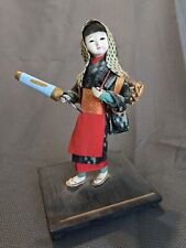 Japanese girl gathering wood, papier-mâché doll with clothes, stand picture